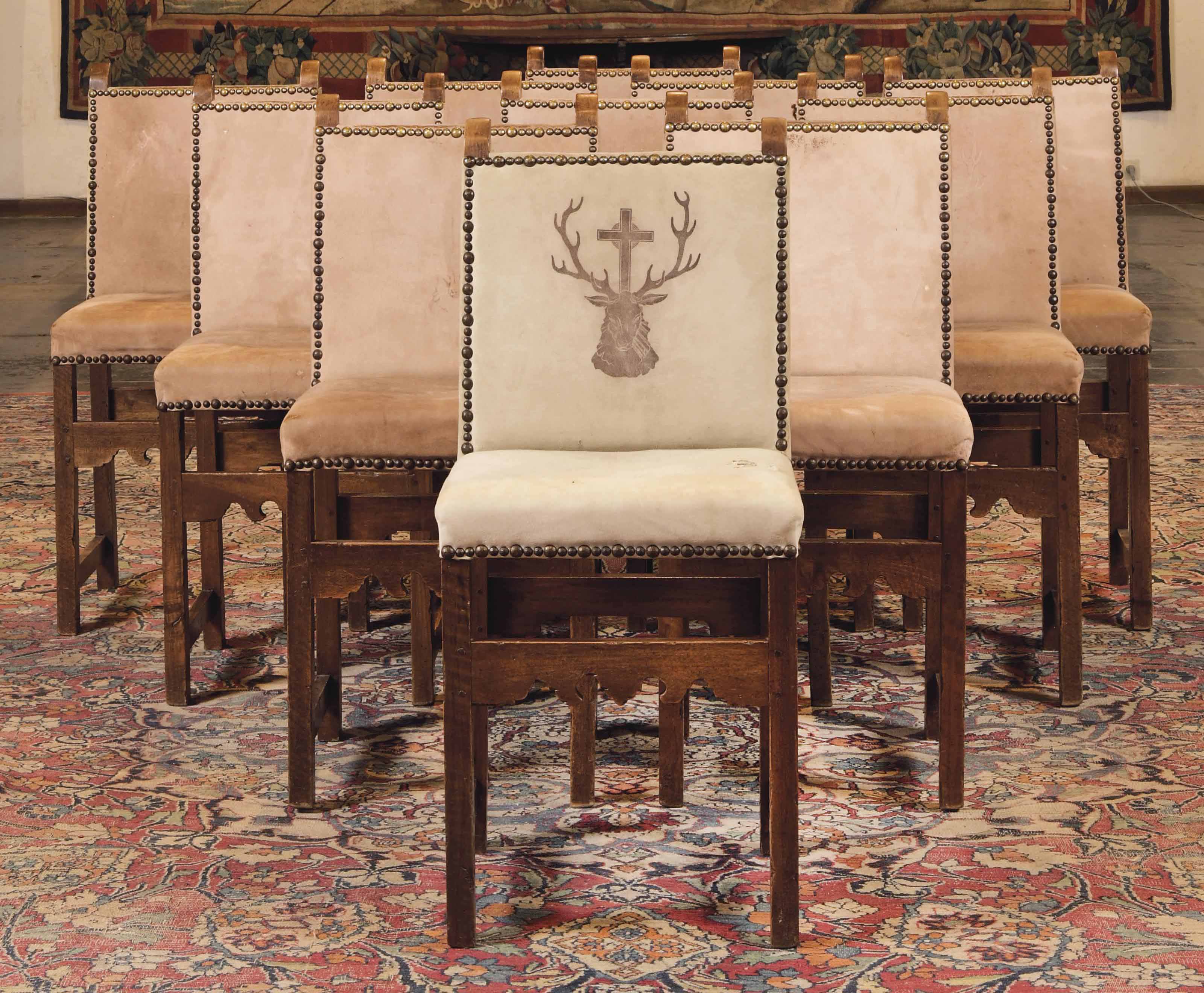 A Set Of Thirteen Walnut Neo Renaissance Dining Chairs Circa