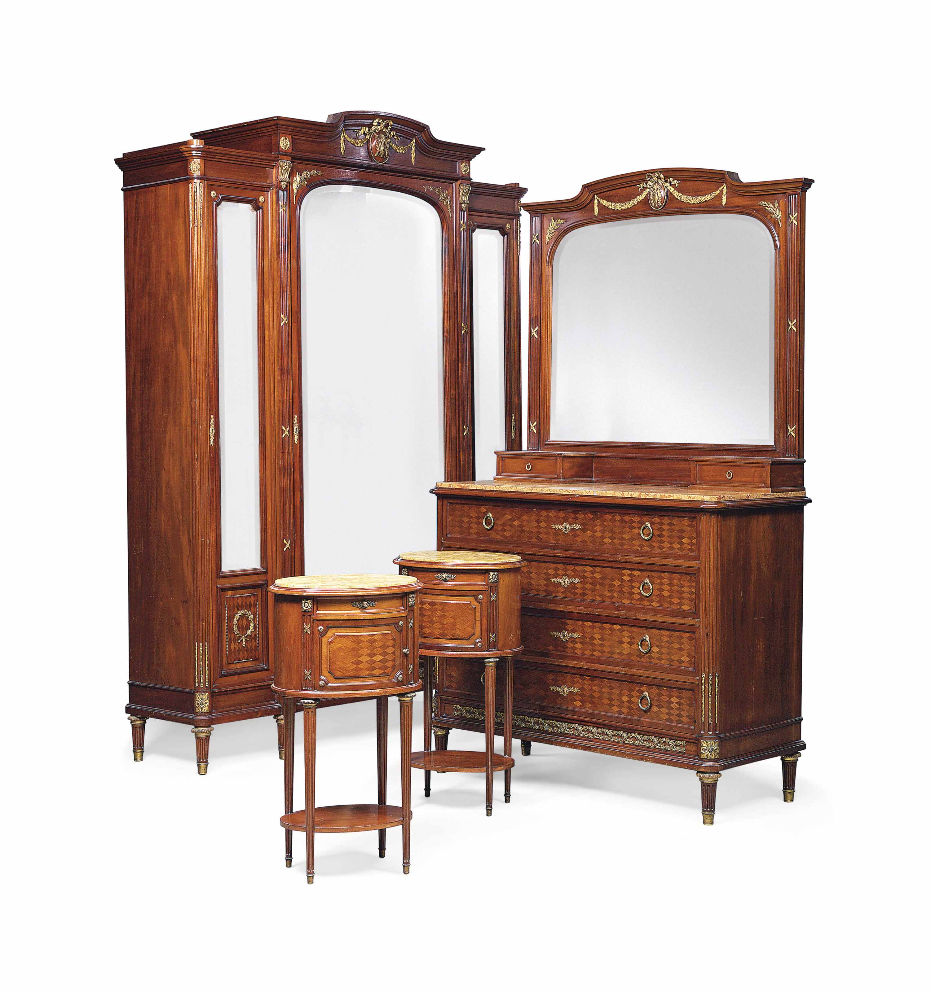A French Ormolu Mounted Mahogany And Parquetry Four Piece Bedroom