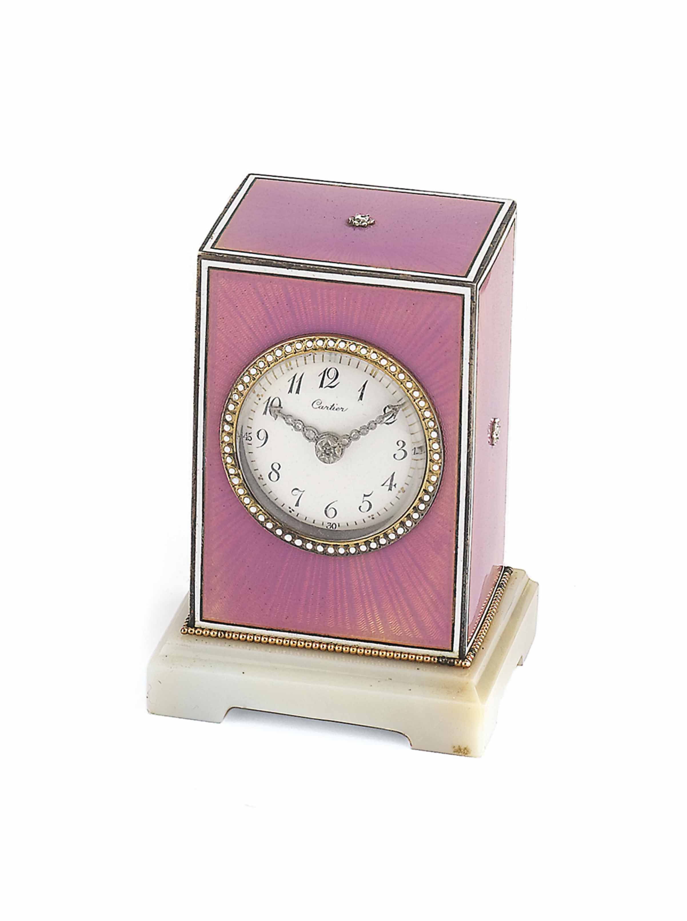 AN EARLY 20TH CENTURY ENAMEL AND DIAMONDSET DESK CLOCK, BY CARTIER