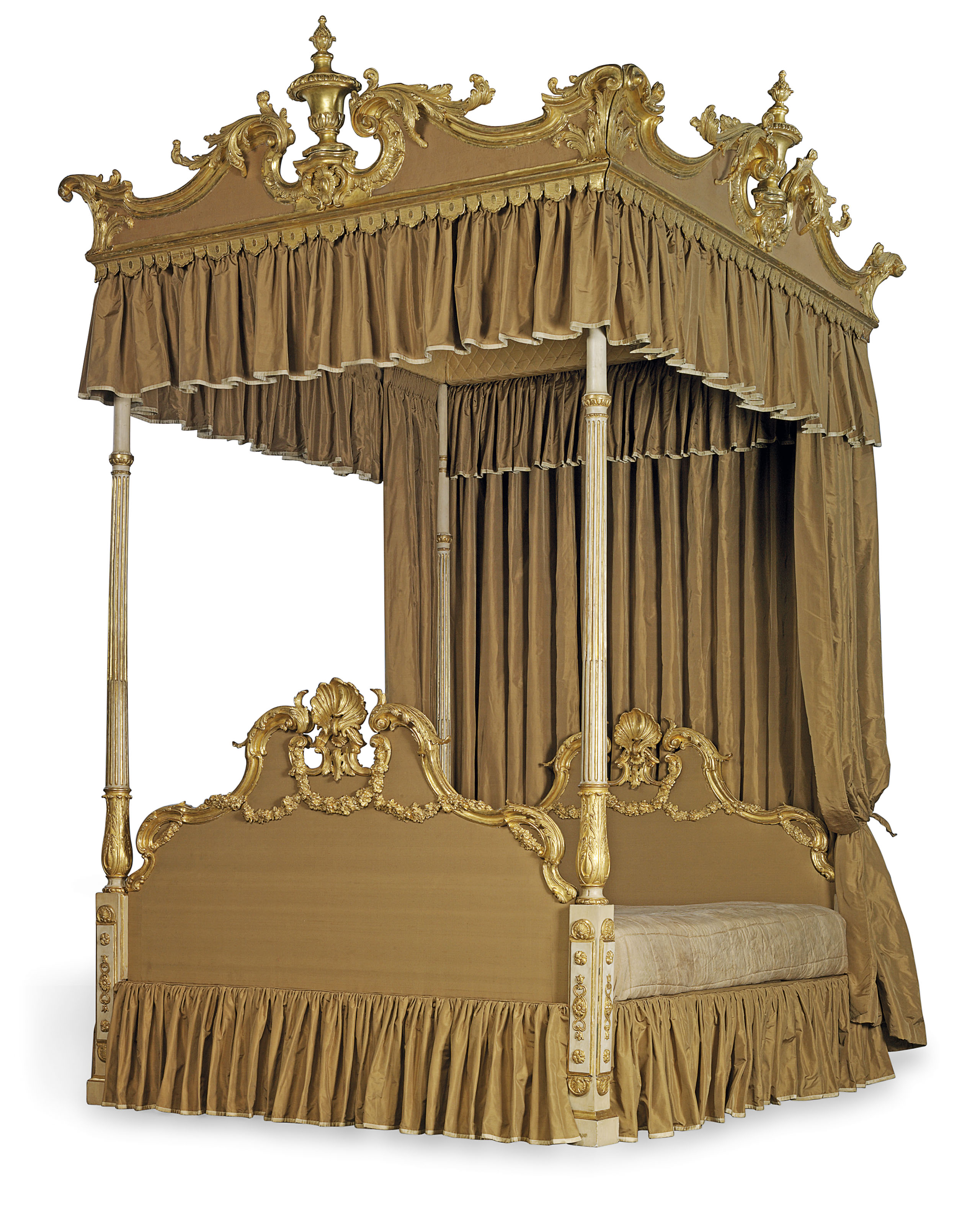 A III CARVED GILTWOOD AND CREAMPAINTED FOURPOST BED , CIRCA