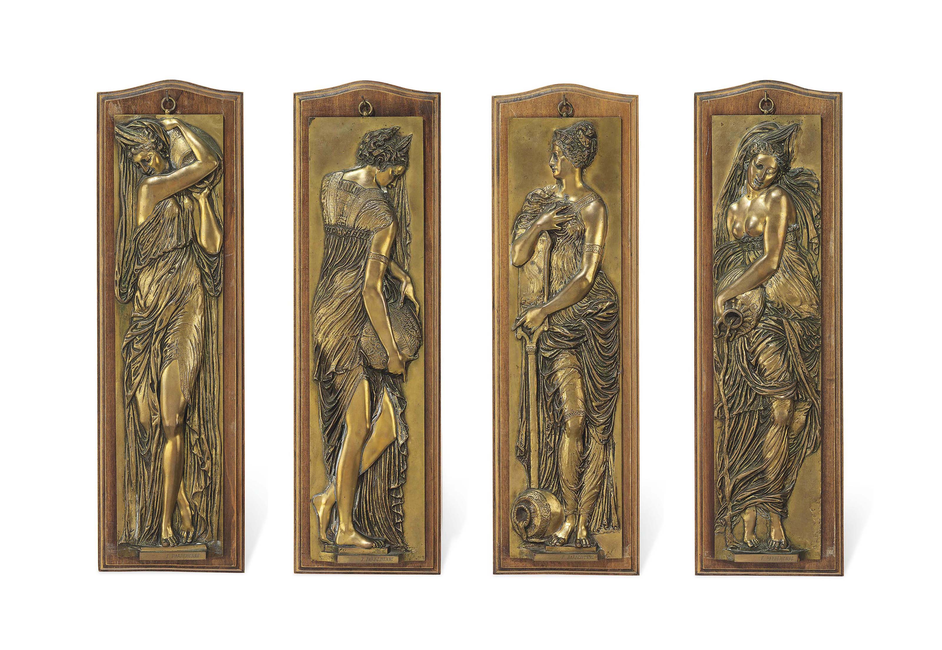 A SET OF FOUR FRENCH GILT BRONZE RELIEF PLAQUES , BY FERDINAND