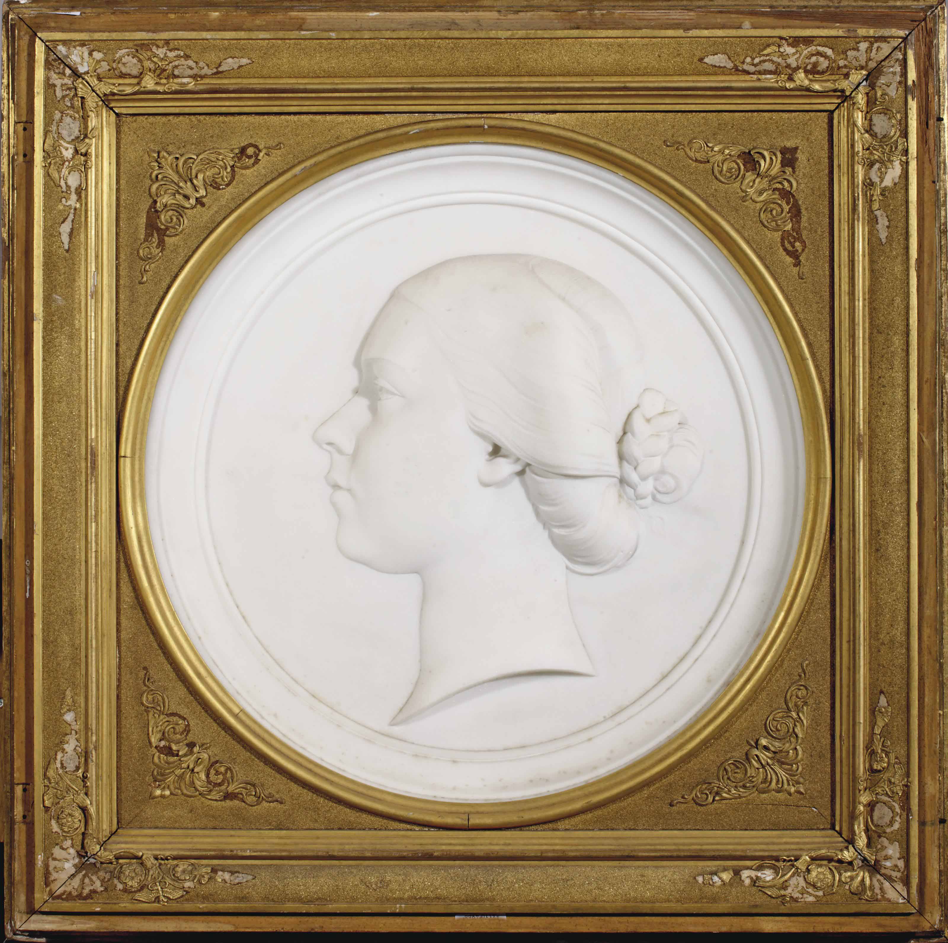 A CIRCULAR CARVED MARBLE PROFILE PORTRAIT RELIEF OF A LADY