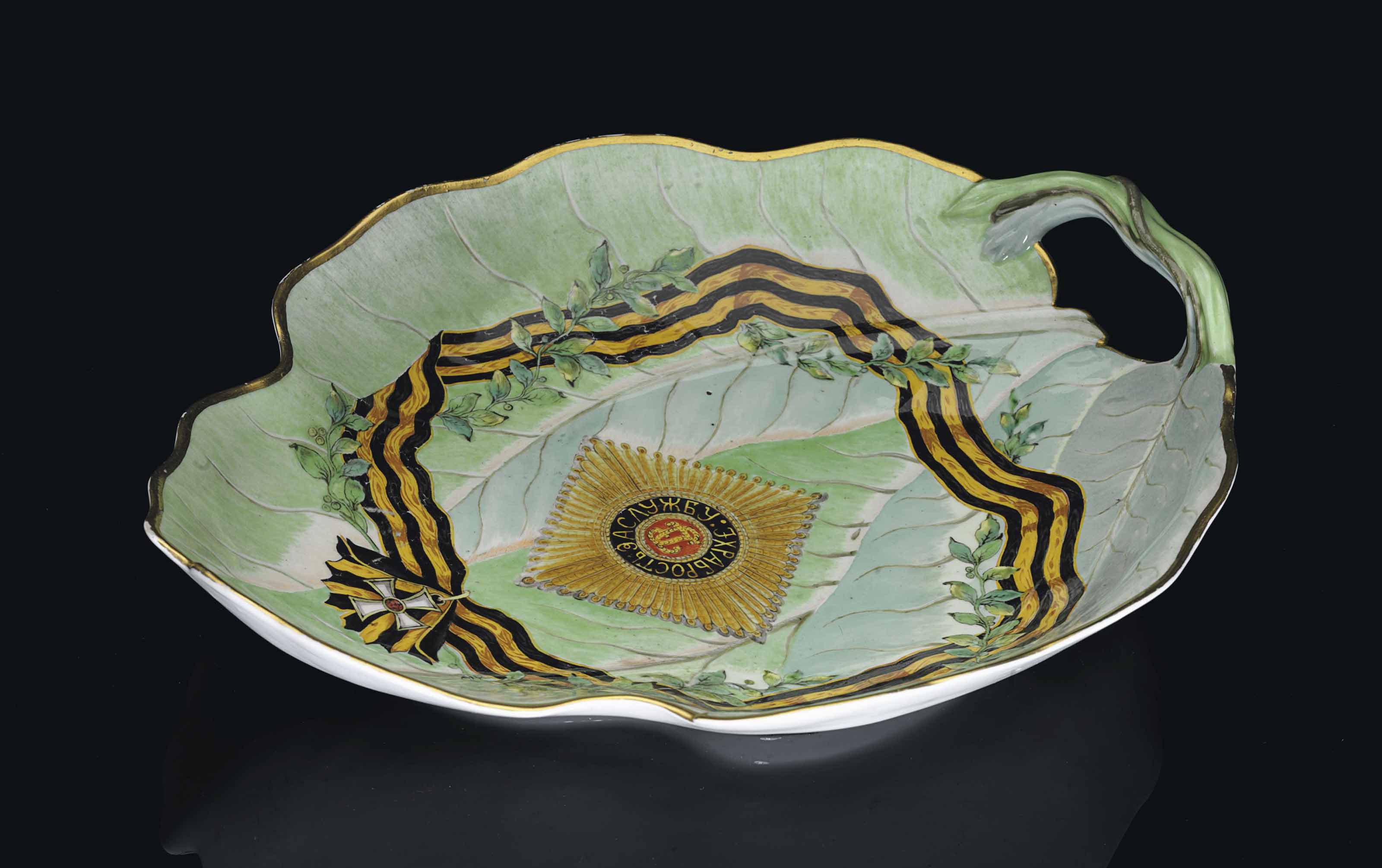 A PORCELAIN DISH FROM THE SERVICE OF THE ORDER OF ST , BY THE