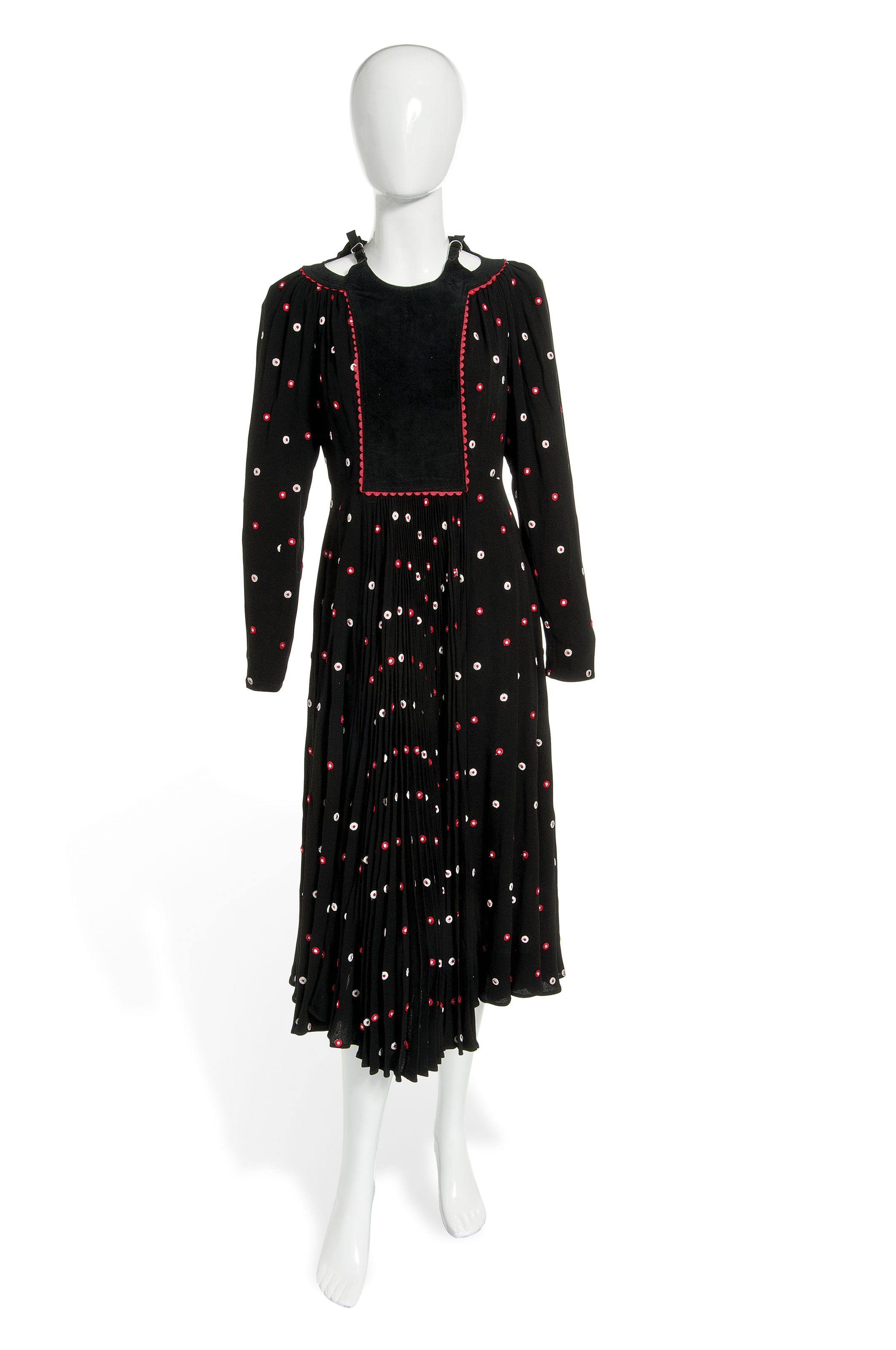A DRESS OF BLACK SILK CREPE AND SUEDE, OSSIE CLARK, 1970S | Christie's