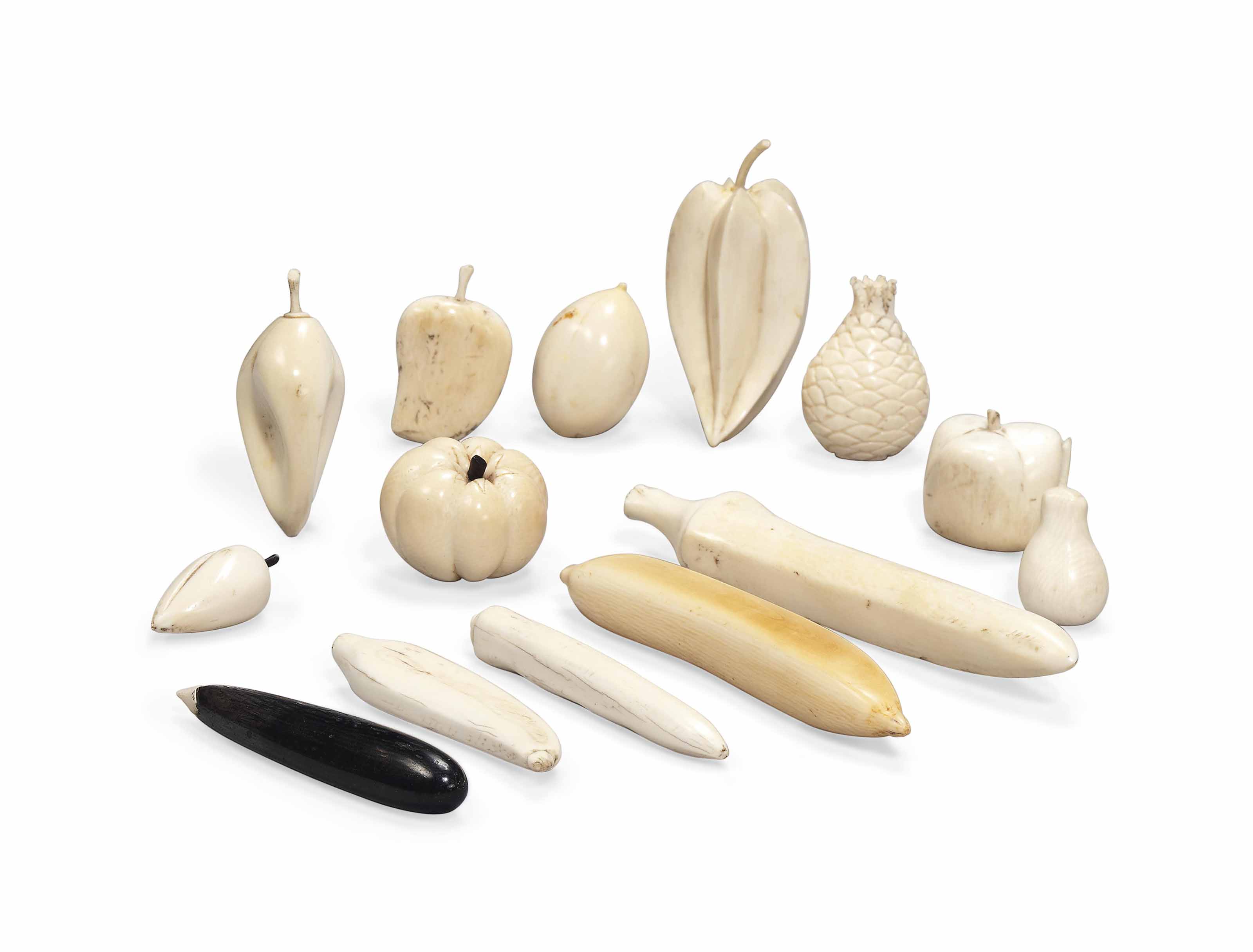 A COLLECTION OF FOURTEEN AFRICAN CARVED IVORY FRUIT , LATE 19TH CENTURY
