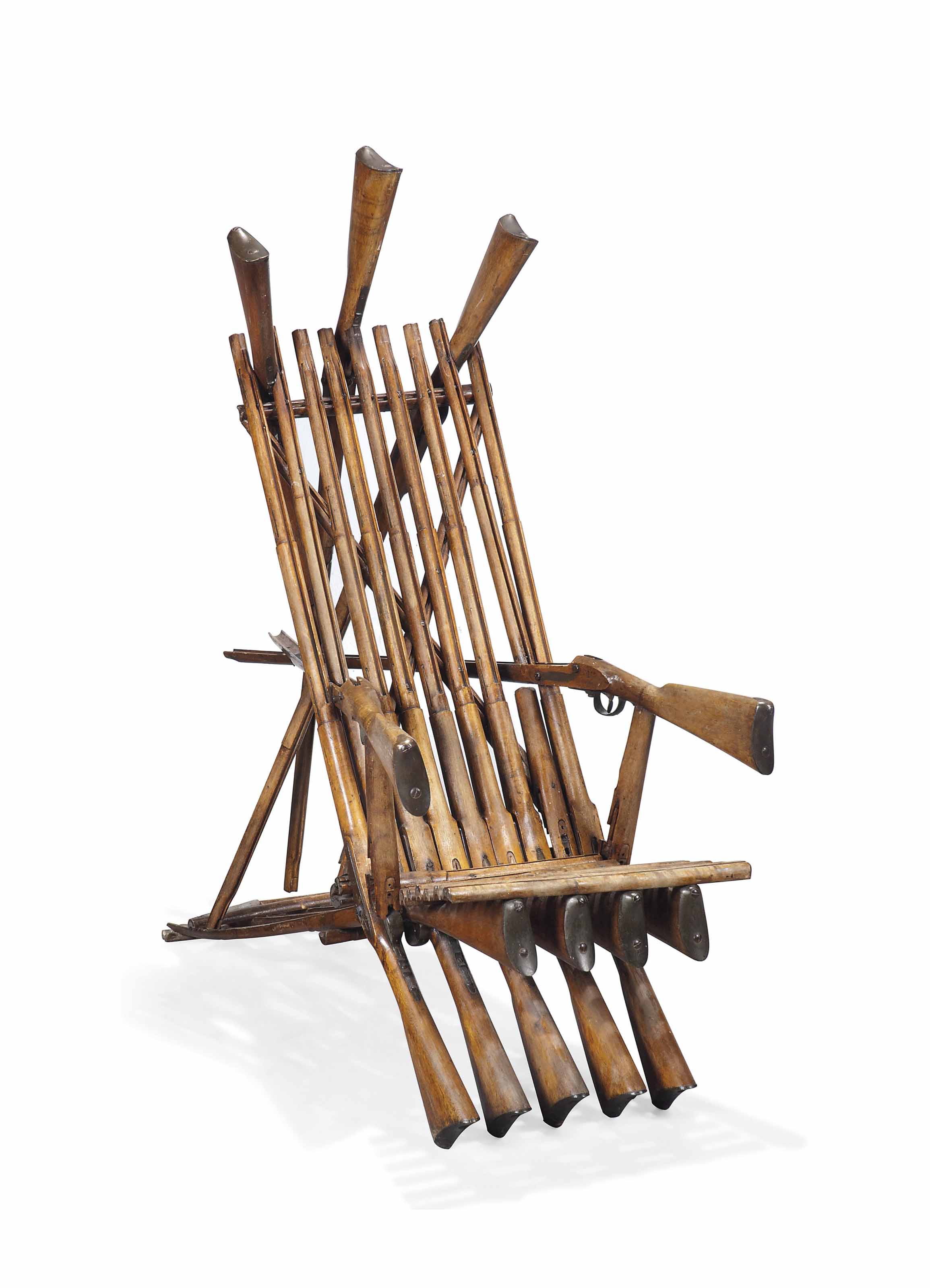 AN UNUSUAL 'GUN' ARMCHAIR , LATE 19TH CENTURY, PROBABLY SWEDISH