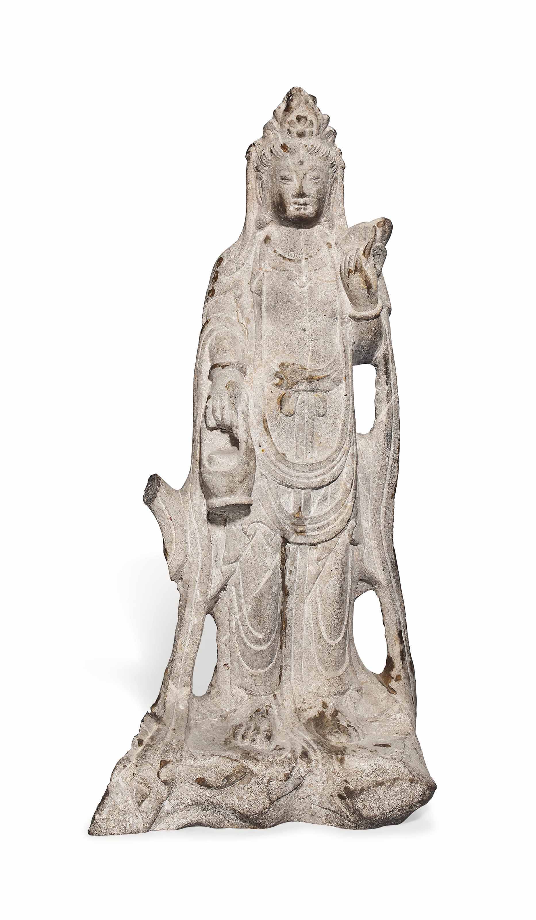 A CHINESE CARVED MARBLE GUANYIN , 20TH CENTURY Christie's