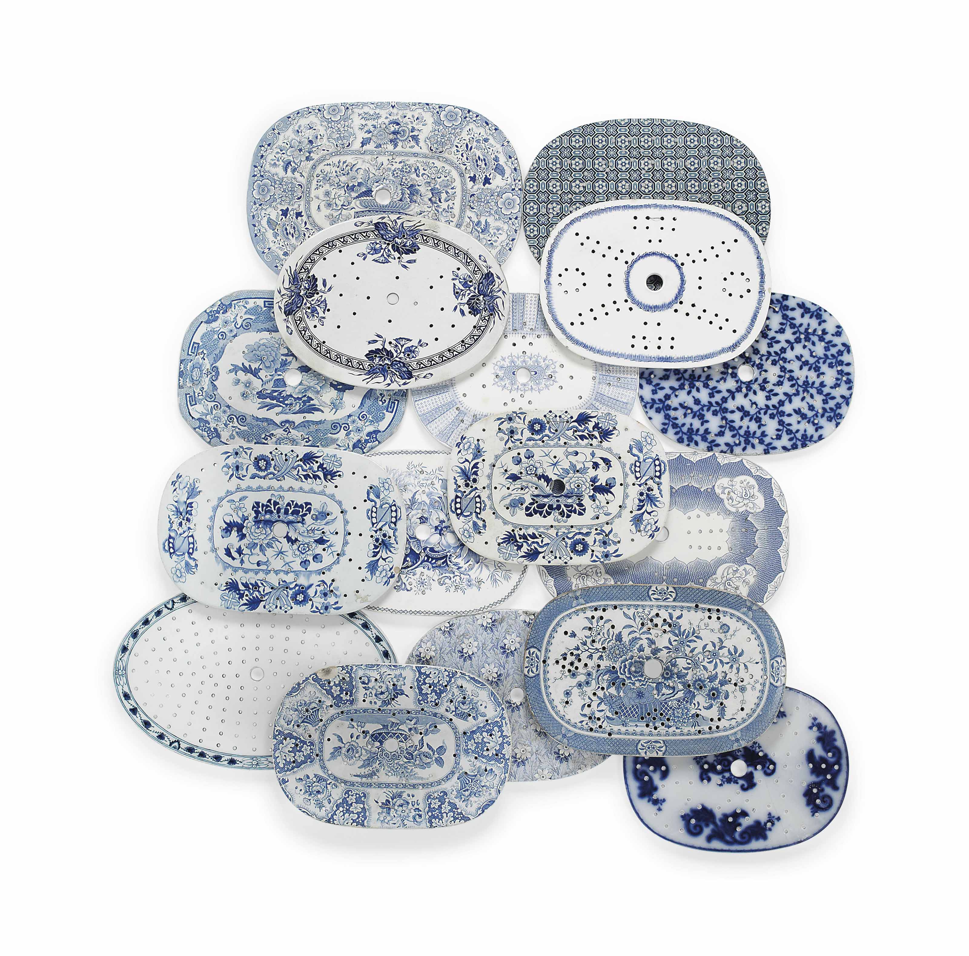 FIFTEEN ENGLISH POTTERY BLUE AND WHITE PRINTED MEAT DRAINERS AND A