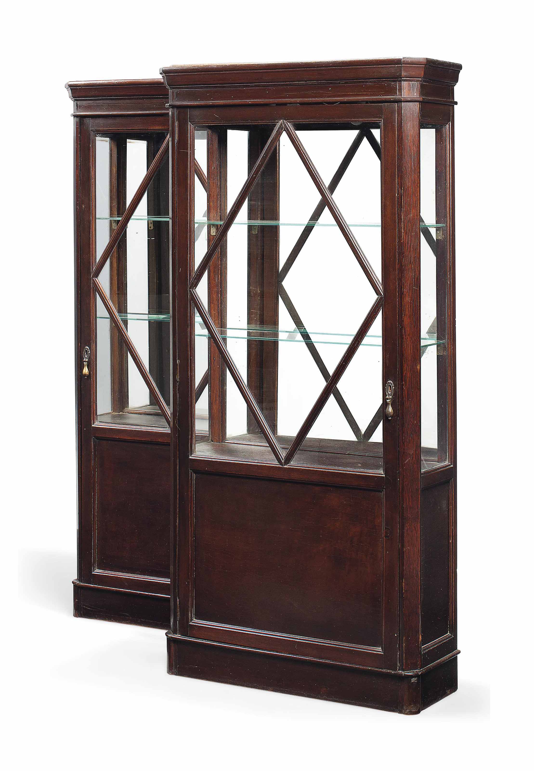 A PAIR OF MAHOGANY DISPLAY , MID20TH CENTURY Christie's