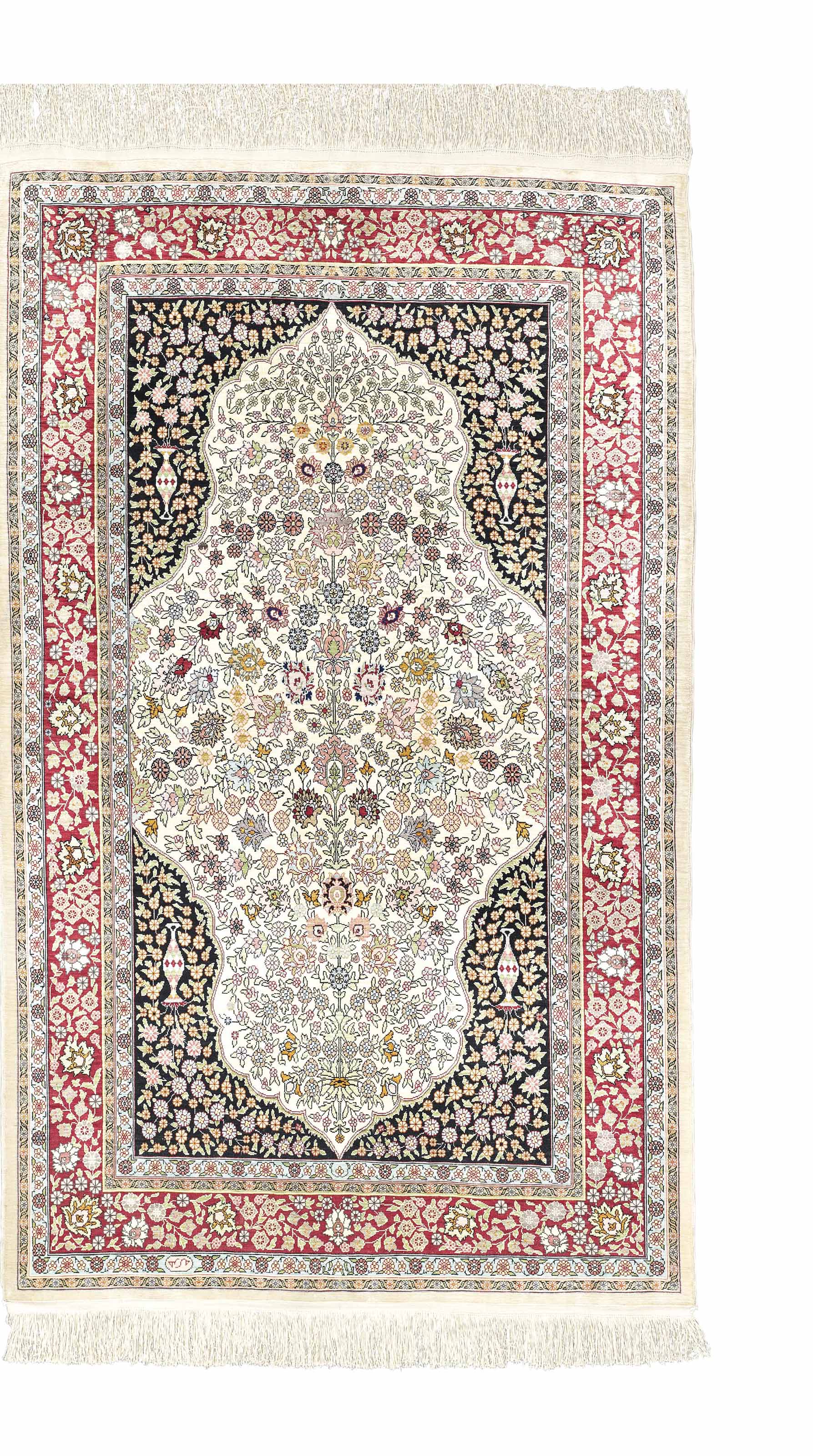 AN EXTREMELY FINE SILK HEREKE RUG, TURKEY , CIRCA MID 20TH CENTURY