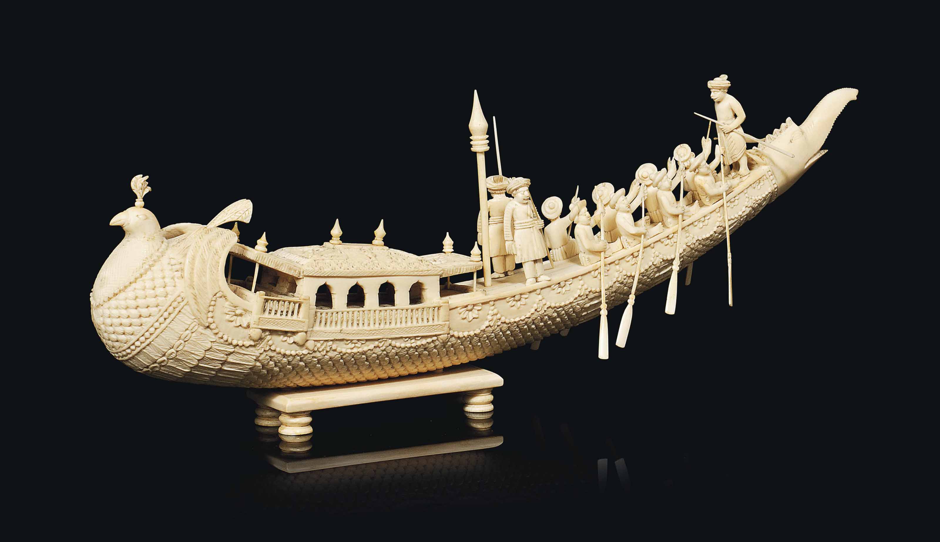 AN INDIAN IVORY CARVED MODEL OF A CEREMONIAL BOAT , LATE 19TH CENTURY