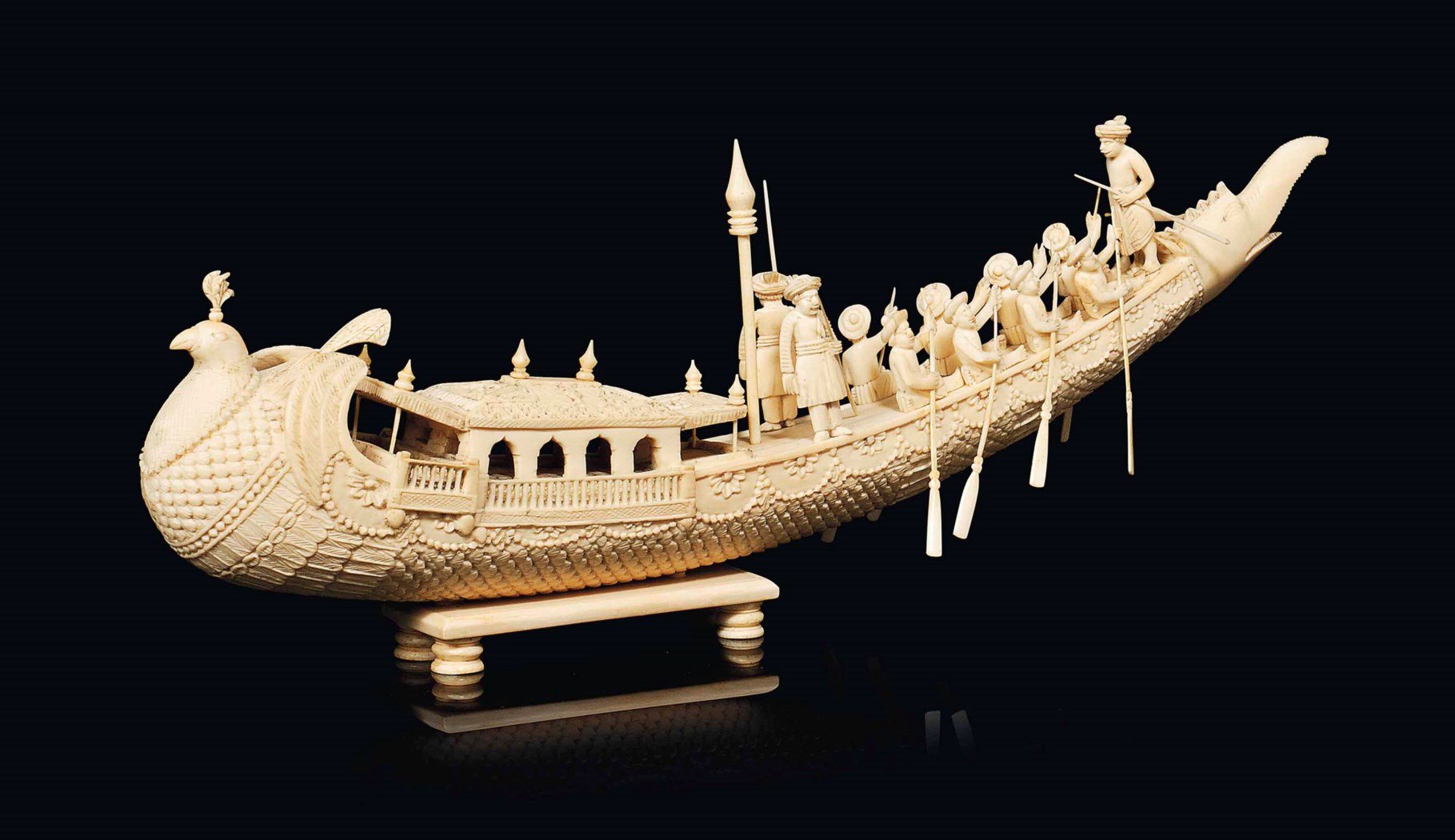 AN INDIAN IVORY CARVED MODEL OF A CEREMONIAL BOAT , LATE 19TH CENTURY