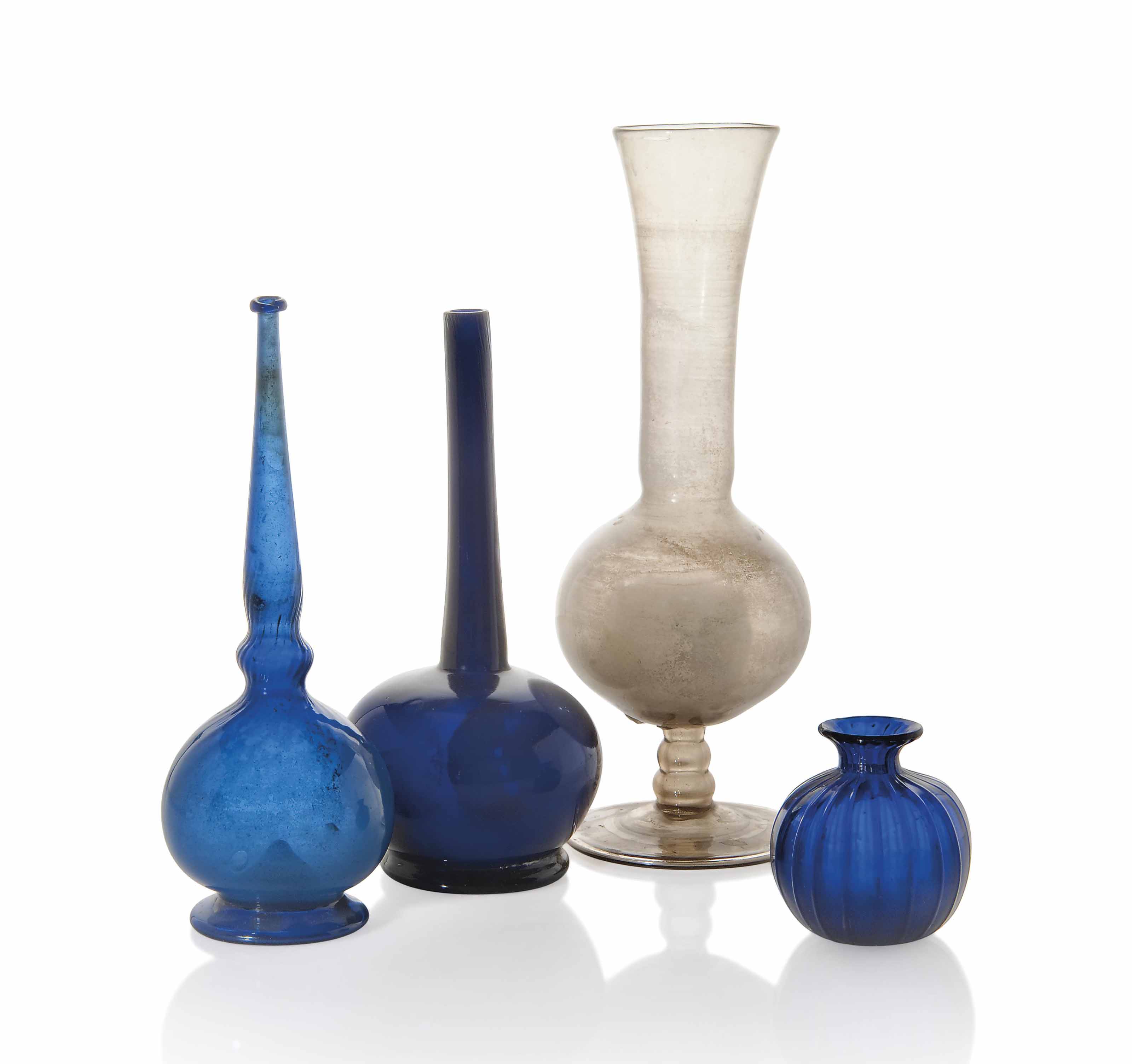 FOUR GLASS VESSELS