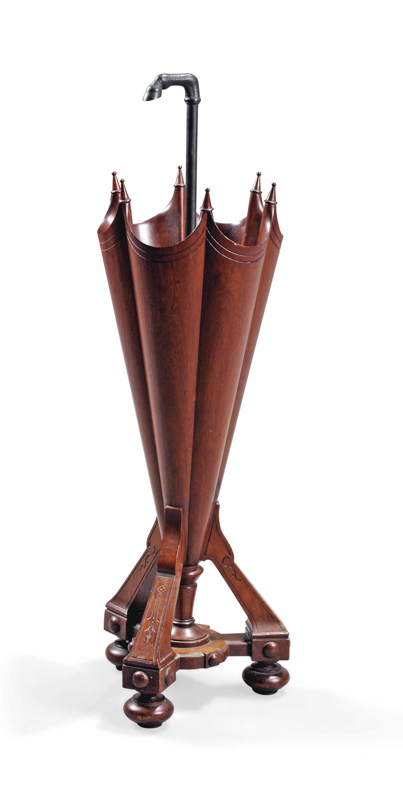 A LATE VICTORIAN WALNUT UMBRELLA STAND , PROBABLY AMERICAN, LATE 19TH
