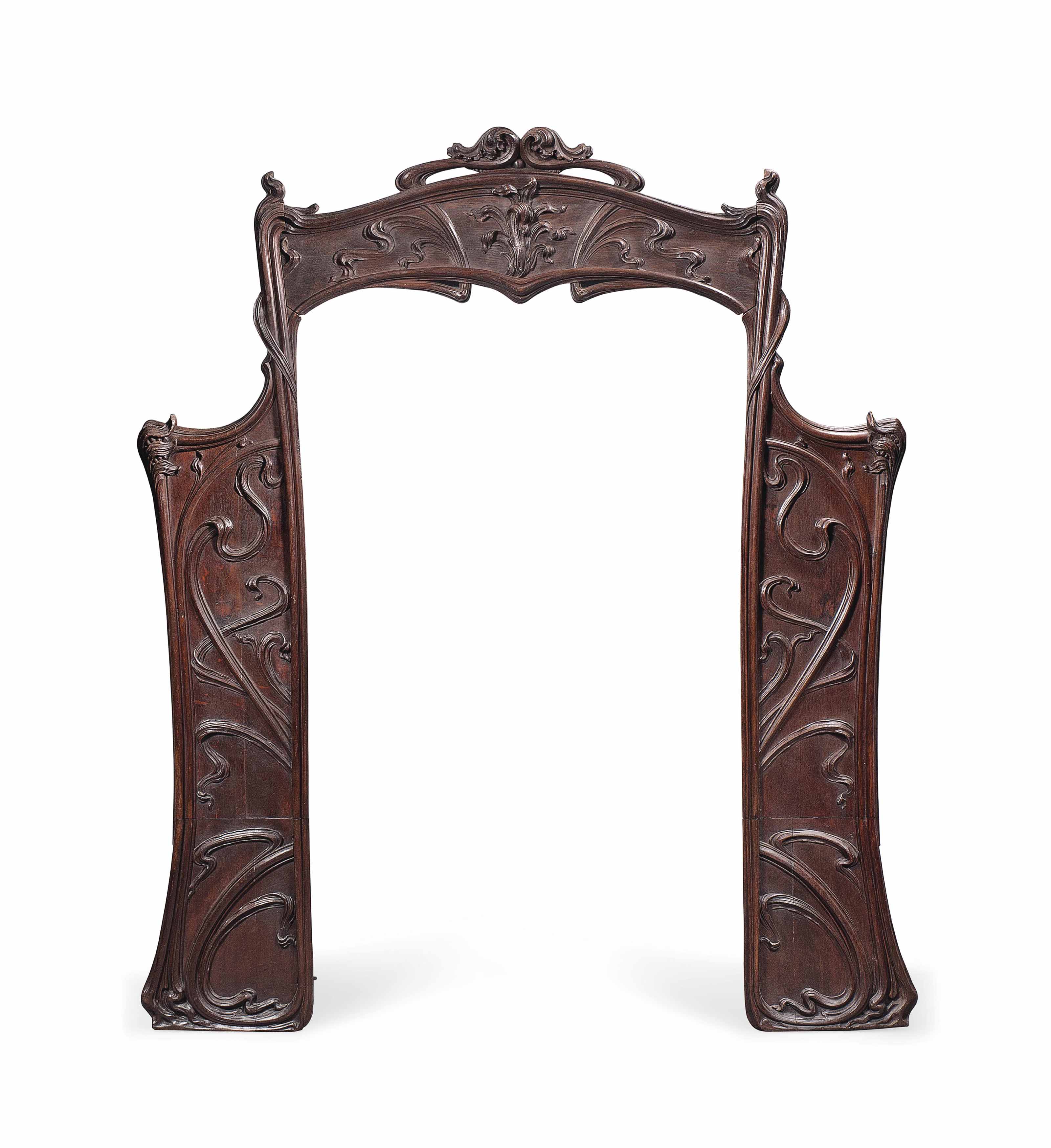 AN ART NOUVEAU CARVED OAK DOOR FRAME , CIRCA 1920 Christie's