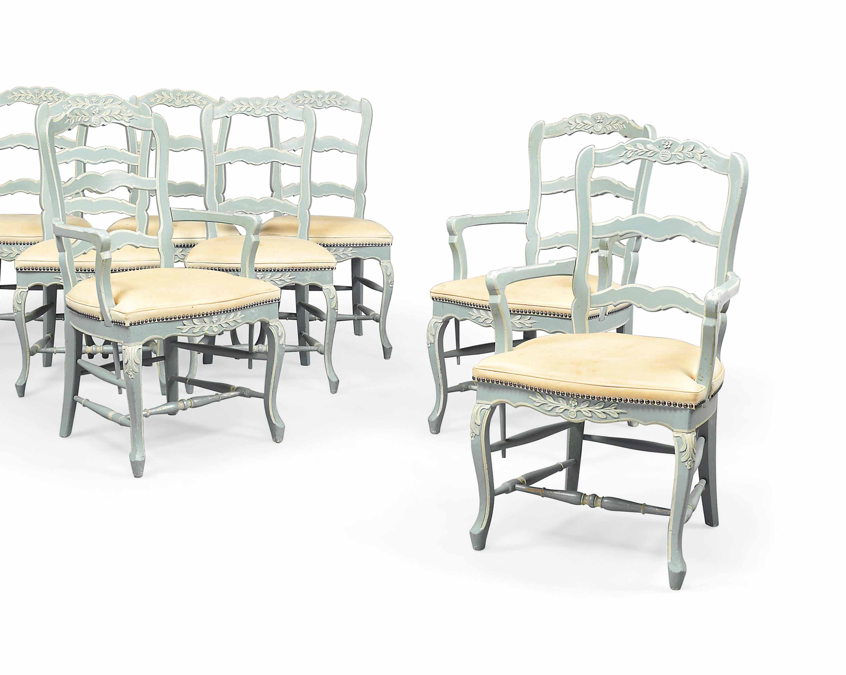 A SET OF EIGHT FRENCH PROVINCIAL BLUE AND CREAMPAINTED DINING CHAIRS