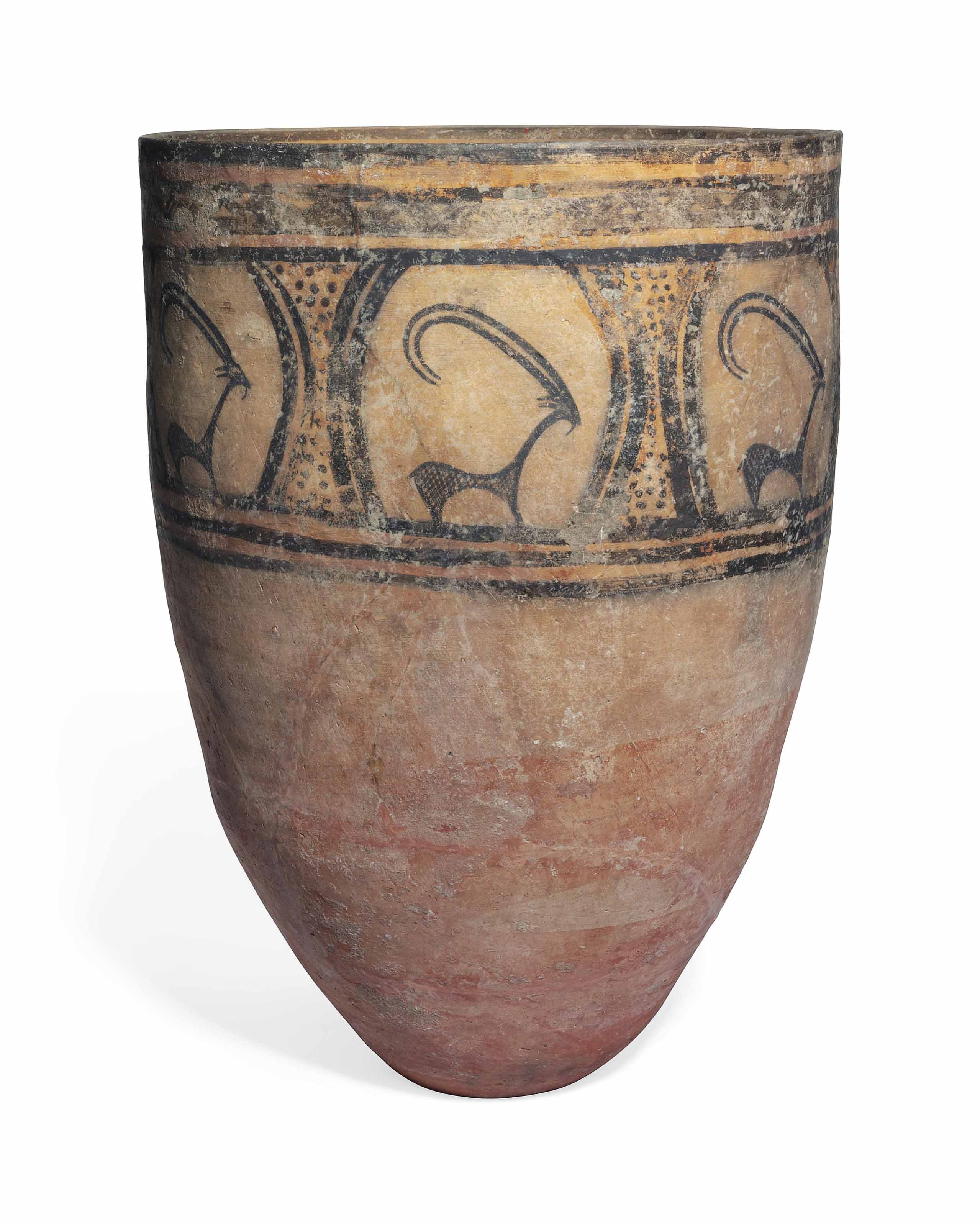 A LARGE PERSIAN POTTERY JAR , CIRCA 3000 B.C. Christie's