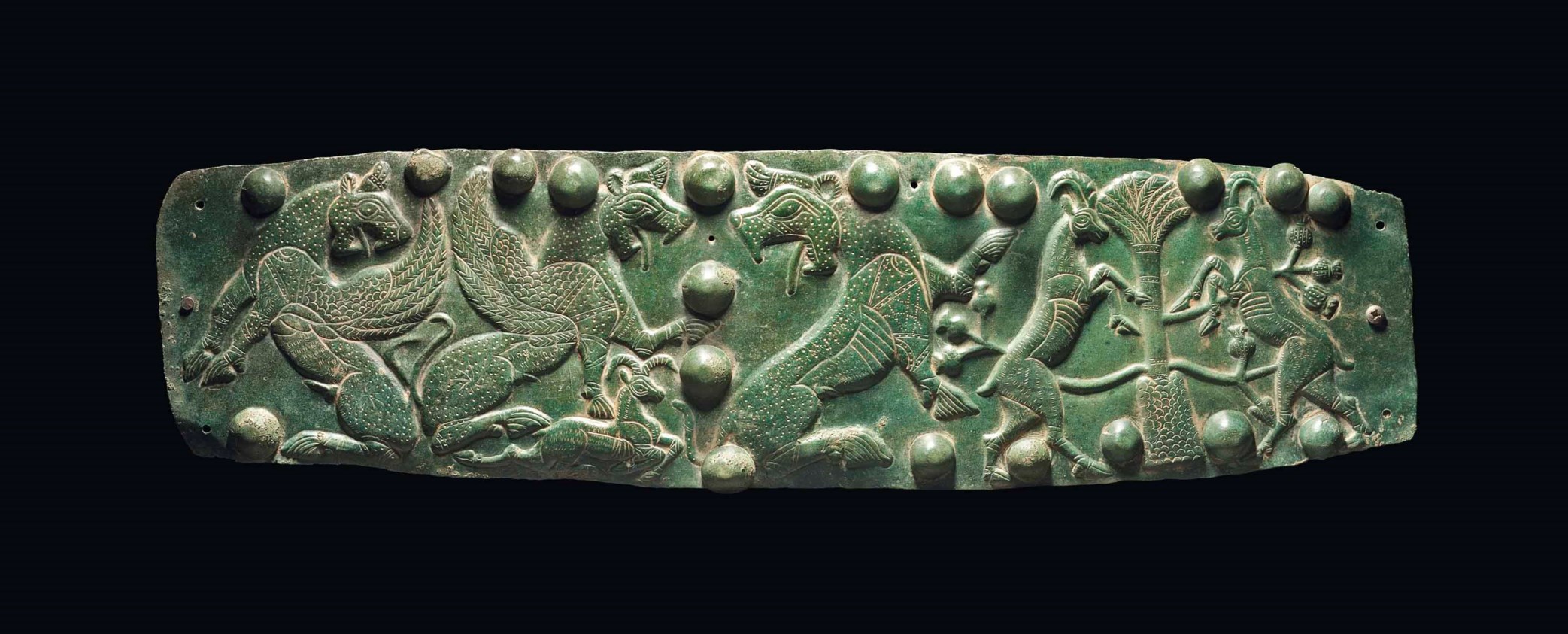 A PERSIAN BRONZE PLAQUE