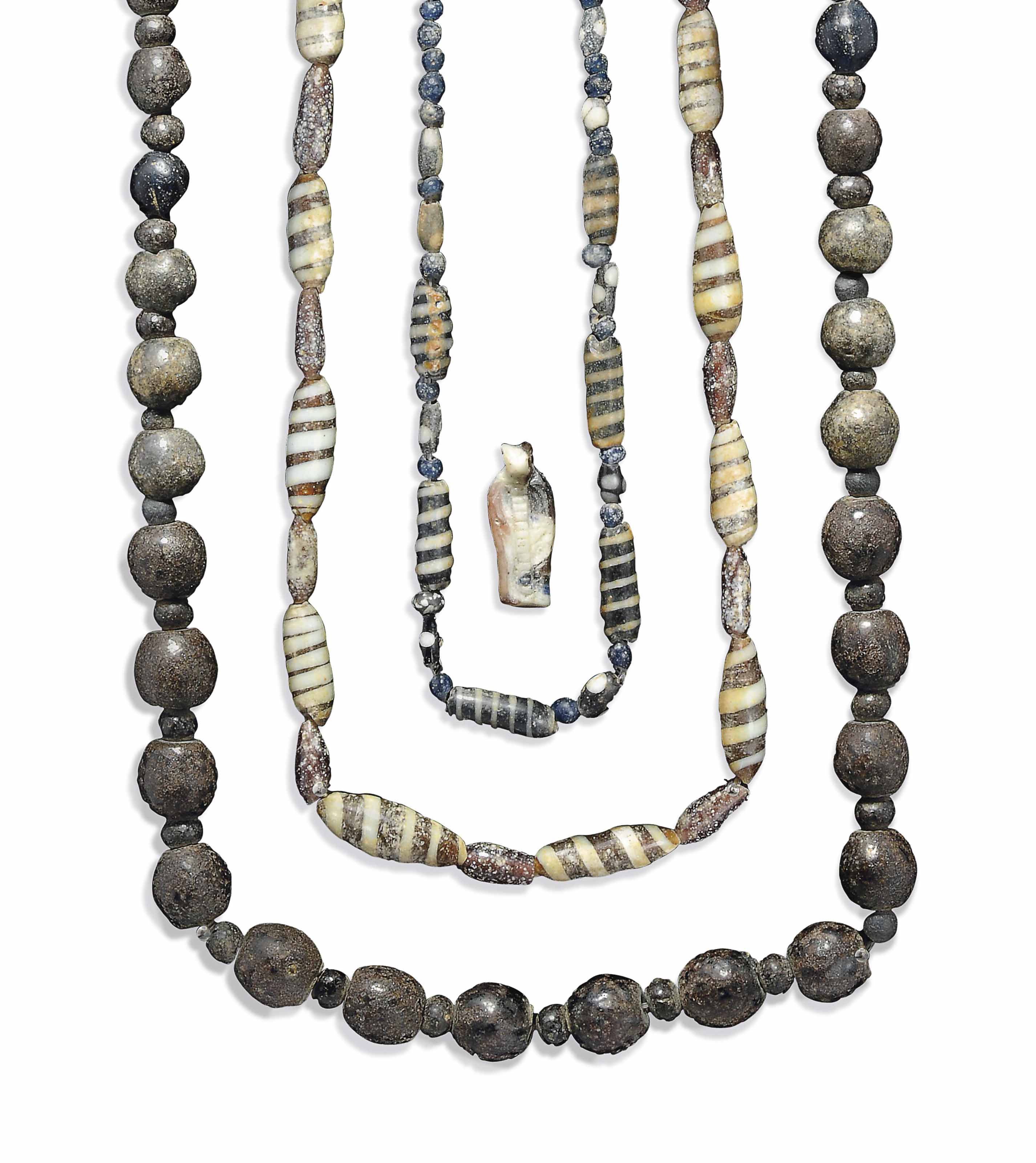 THREE EGYPTIAN GLASS BEAD NECKLACES , NEW KINGDOM, DYNASTY XVIII