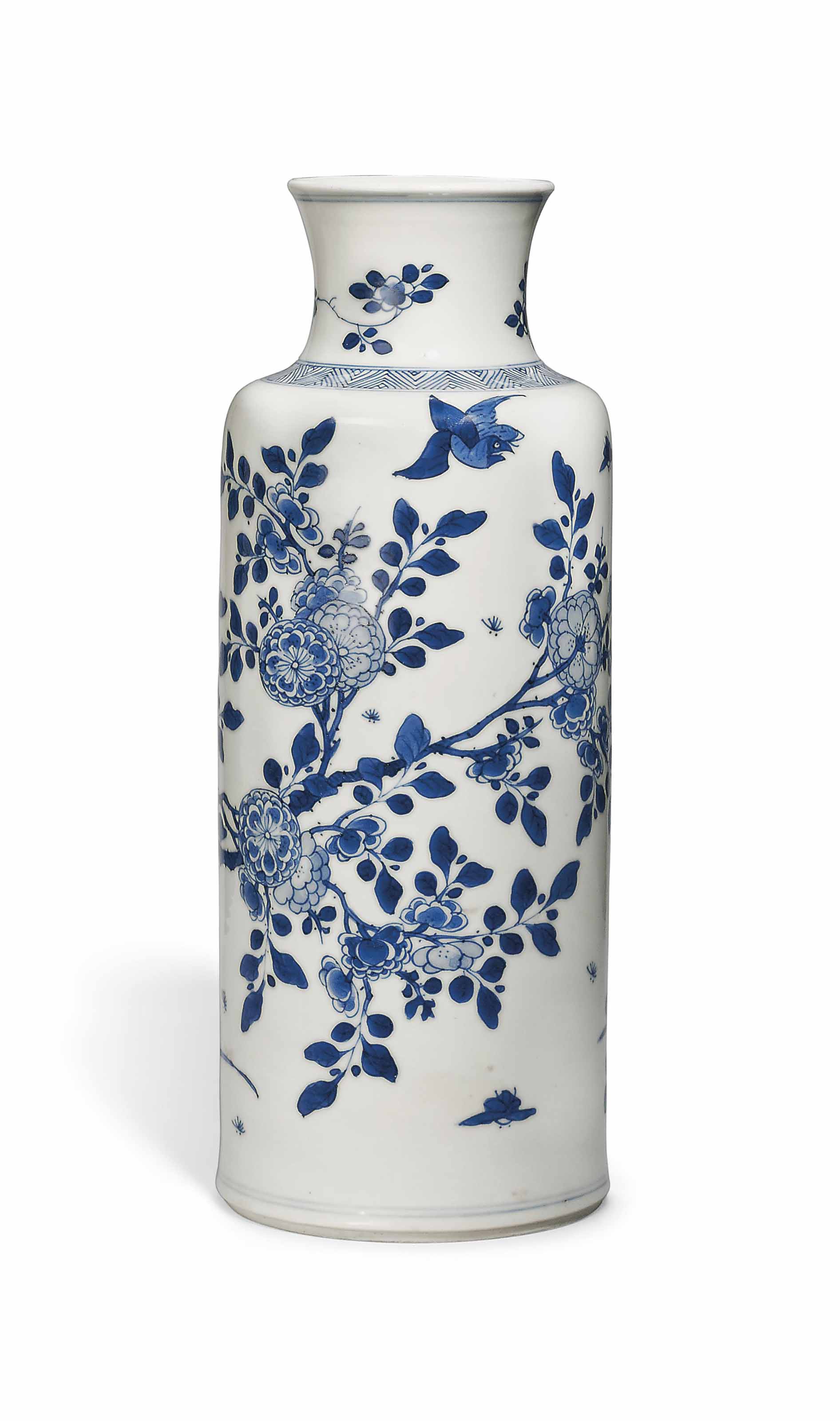 a blue and white bird and flower detailsx