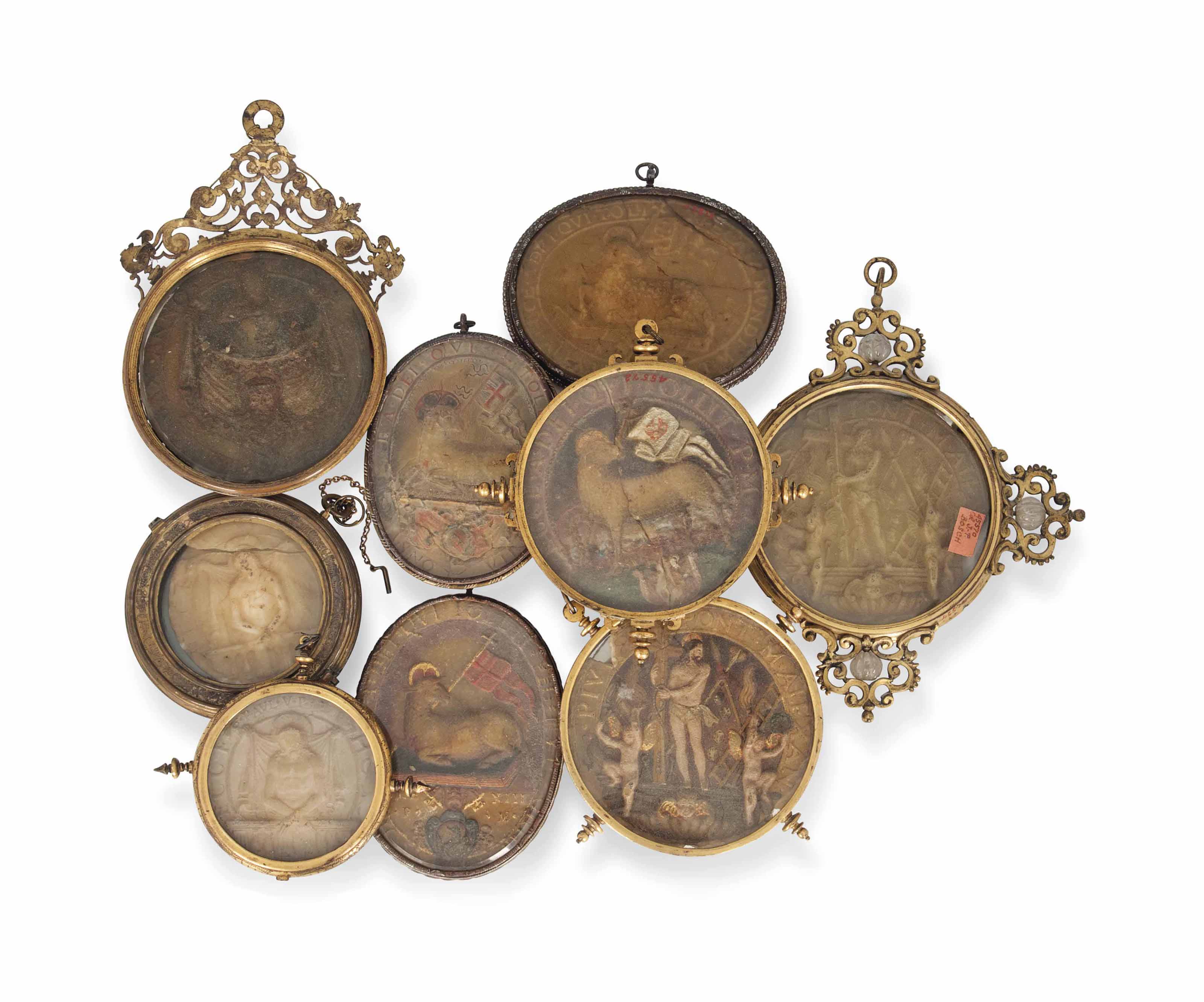 NINE SPANISH WAX DOUBLESIDED RELIEF PLAQUES IN GILTMETAL OR STEEL