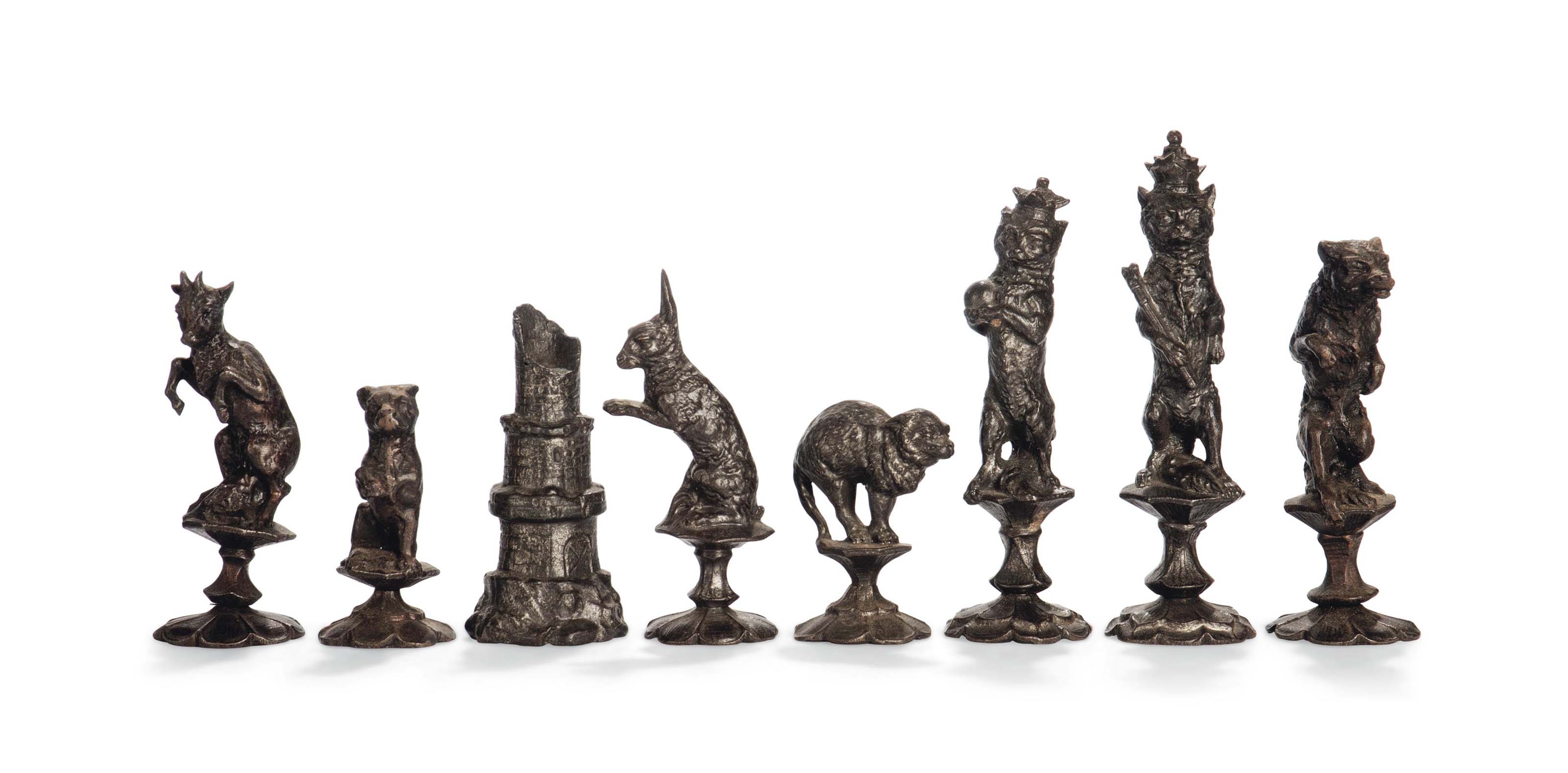 A GERMAN CAST IRON ‘REYNARD THE FOX’ CHESS SET