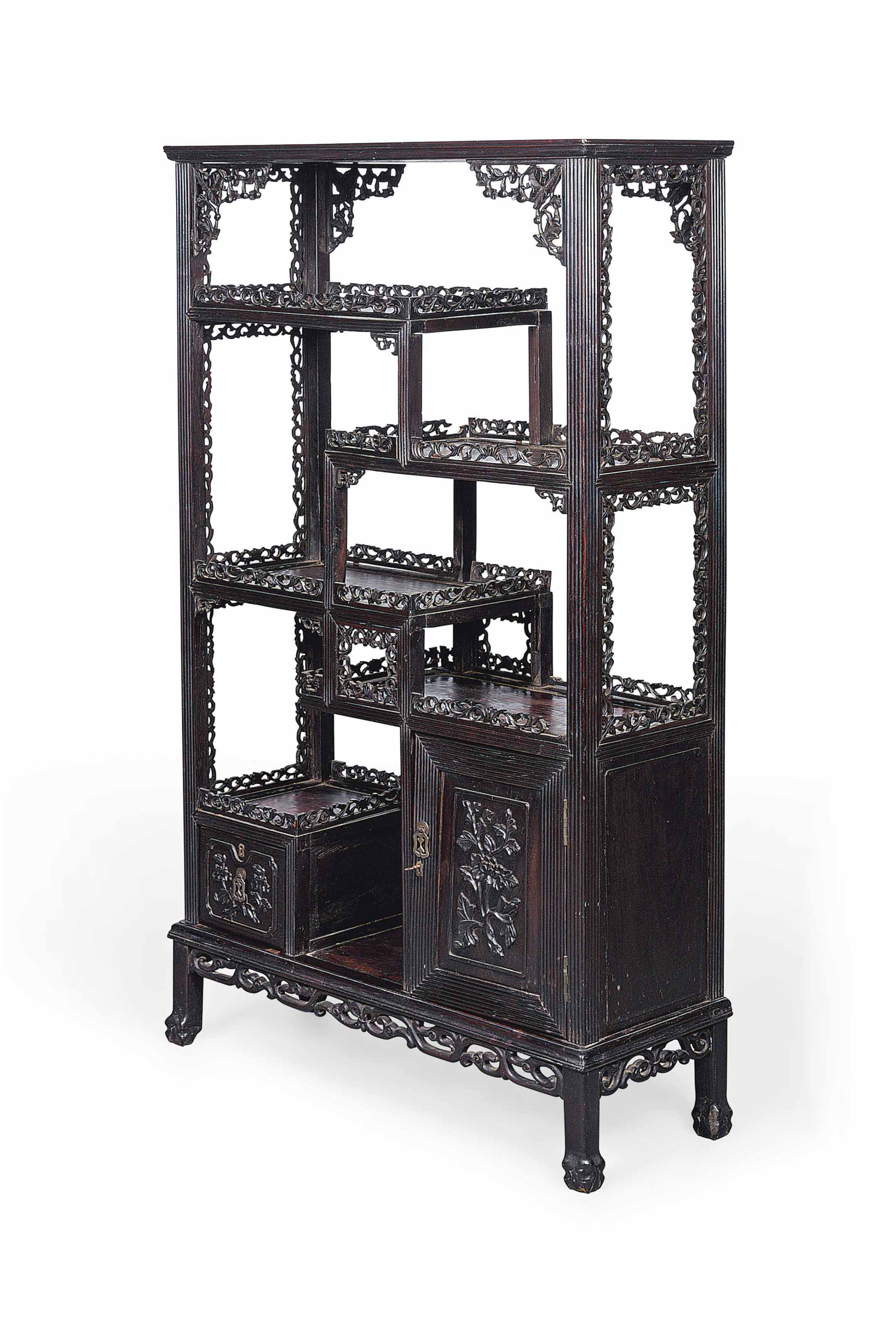 A CHINESE CARVED HARDWOOD DISPLAY