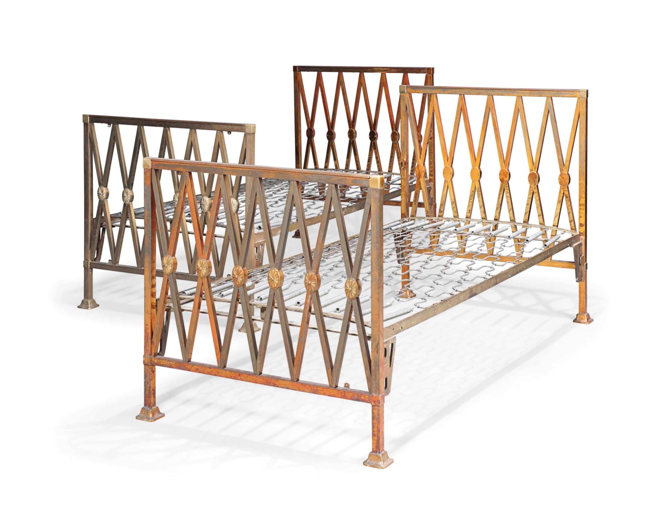 A PAIR OF EDWARDIAN BRASS BEDS