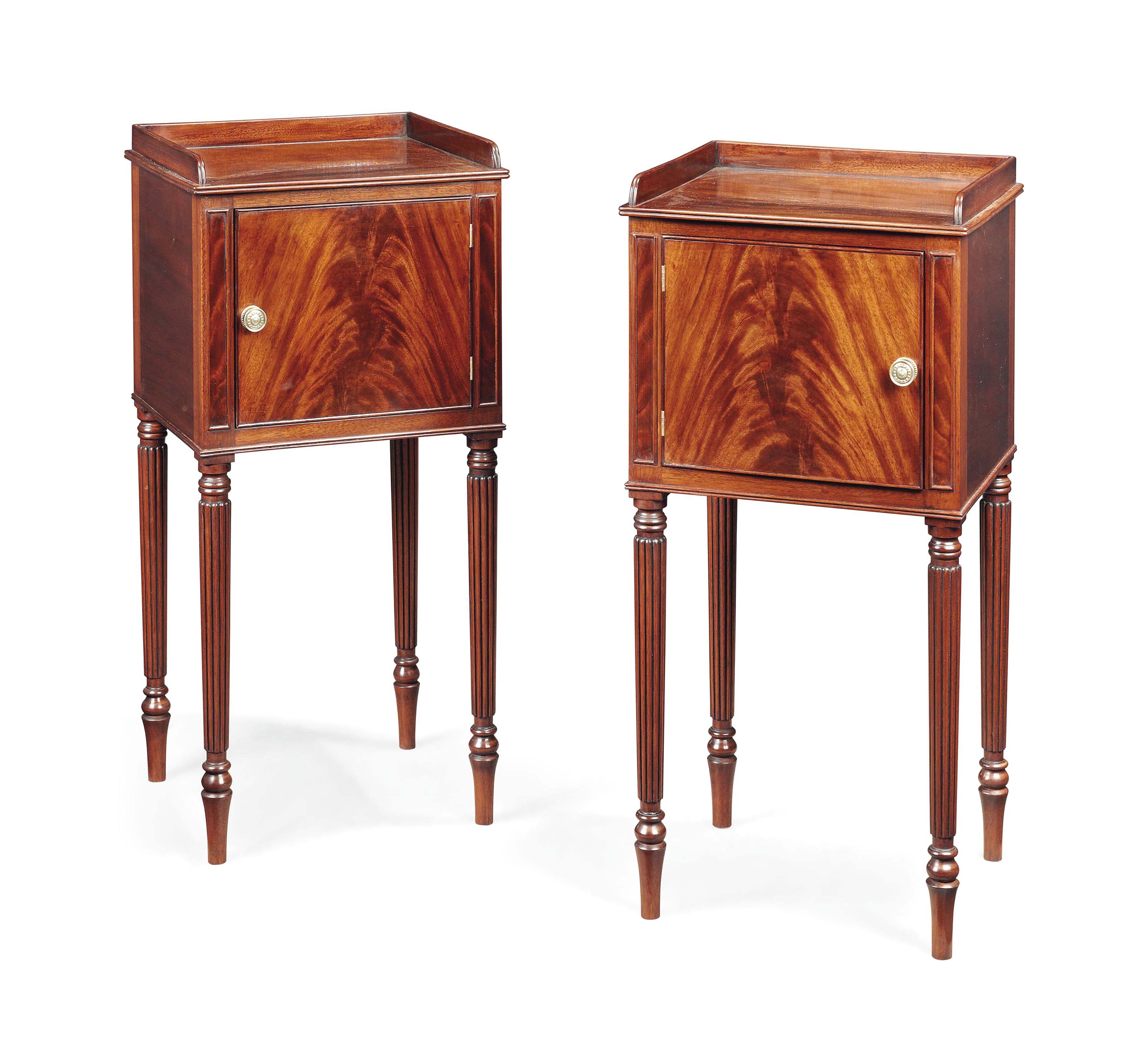 A PAIR OF MAHOGANY BEDSIDE TABLES