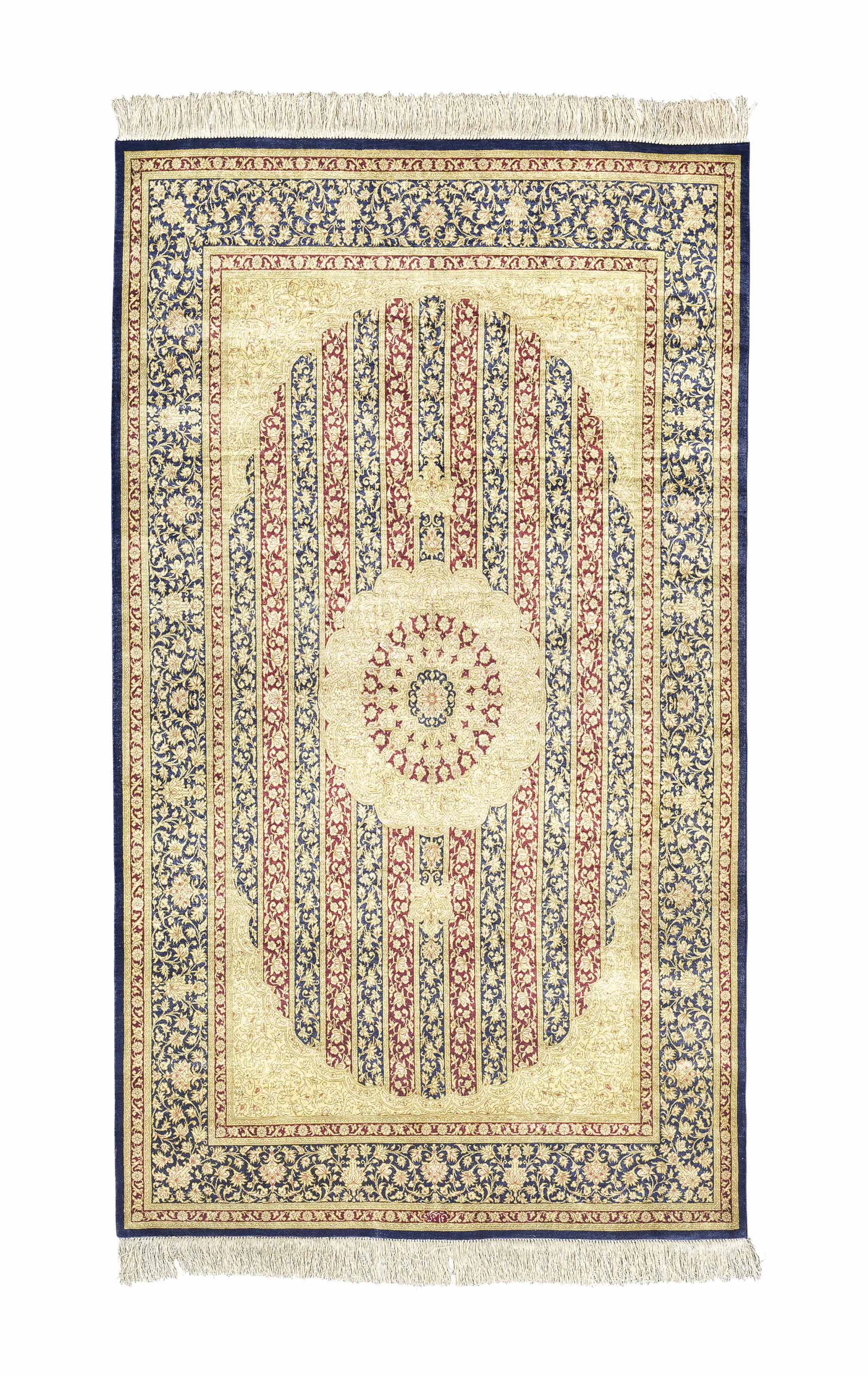 AN EXTREMELY FINE SILK QUM RUG, CENTRAL PERSIA , CIRCA SECOND HALF OF