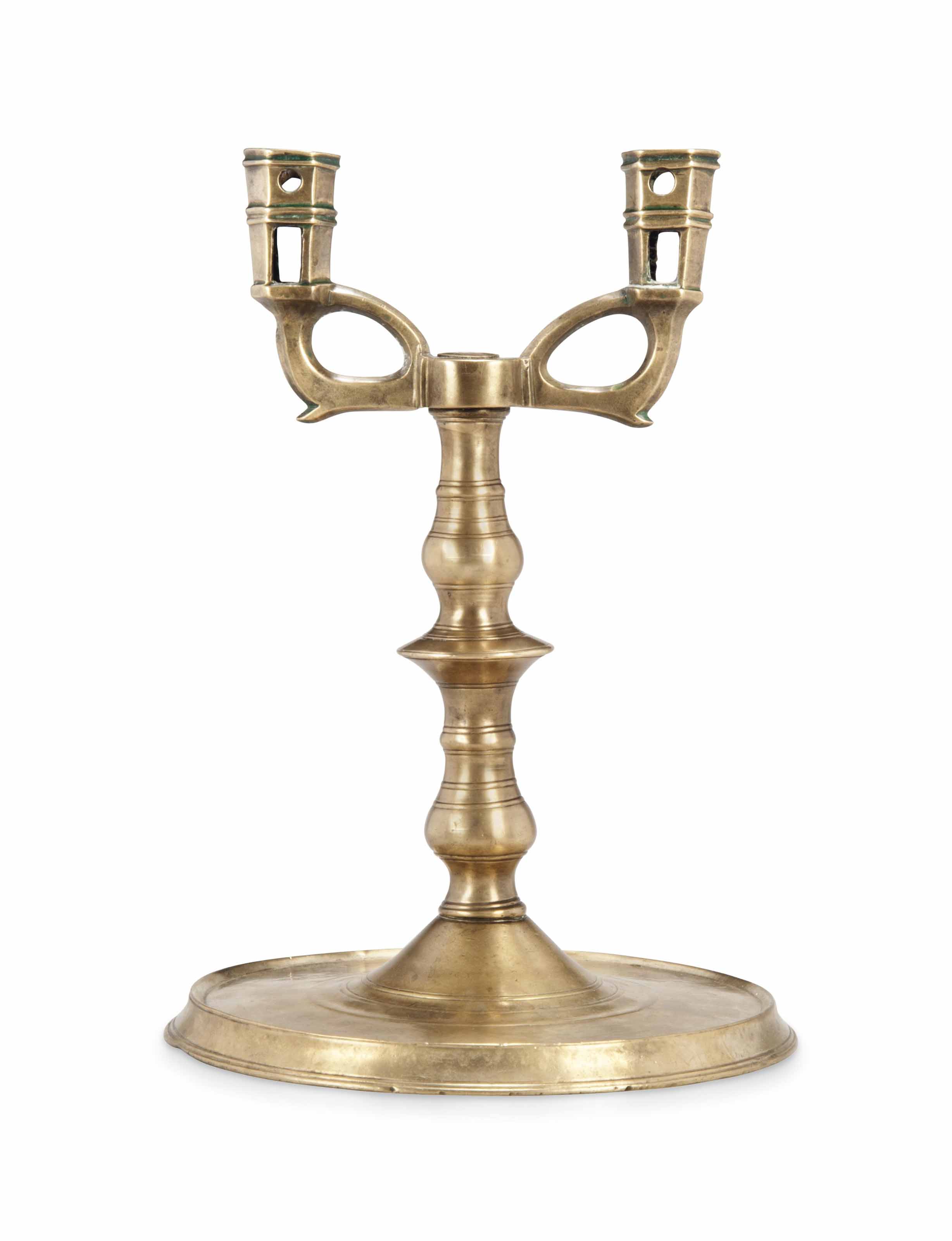 A FLEMISH OR GERMAN BRASS CANDLESTICK