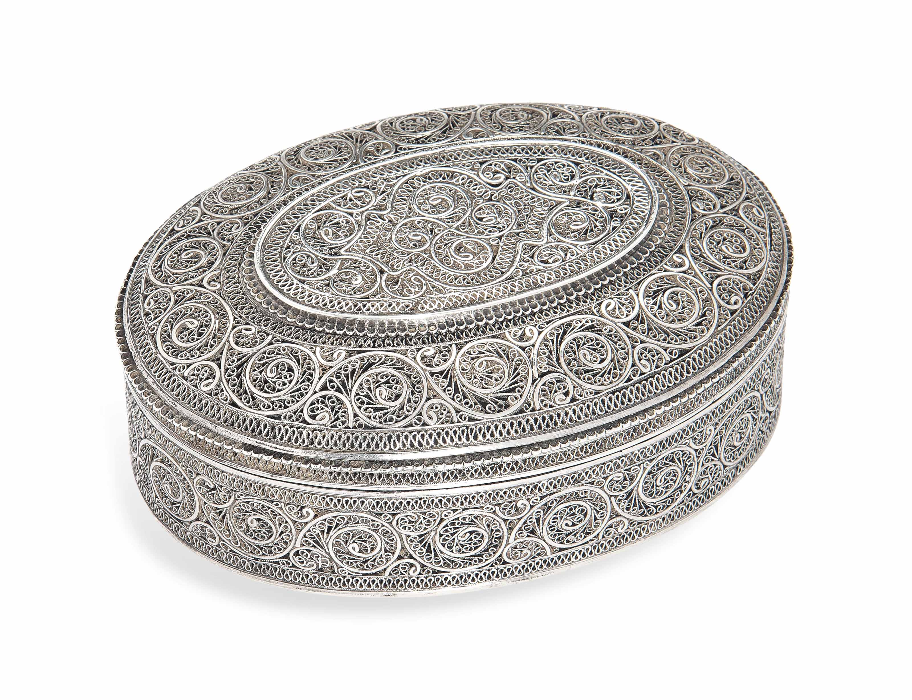 A SILVER FILIGREE BOX