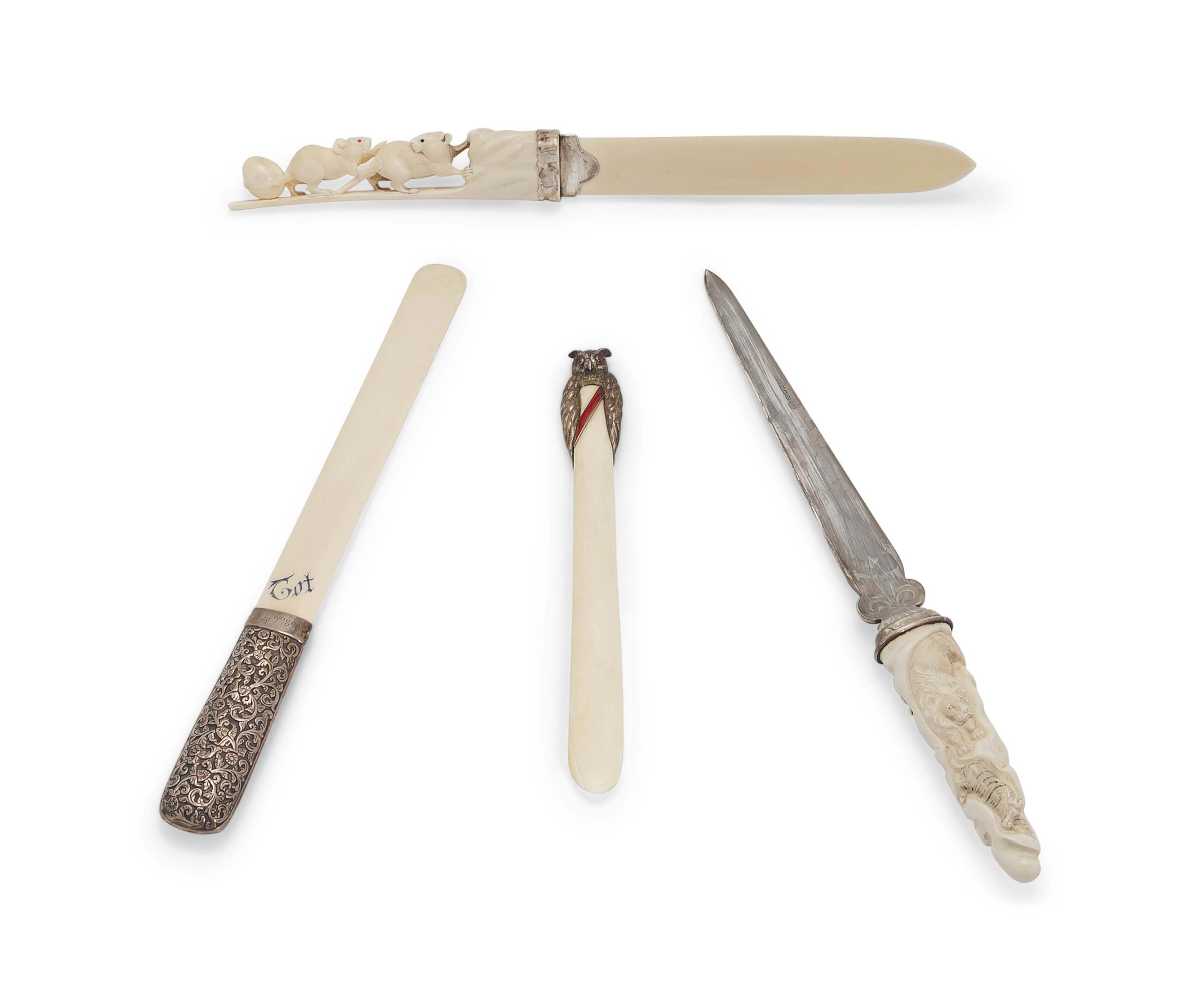 A GROUP OF FOUR SILVERMOUNTED IVORY PAPER KNIVES , VARIOUS DATES AND