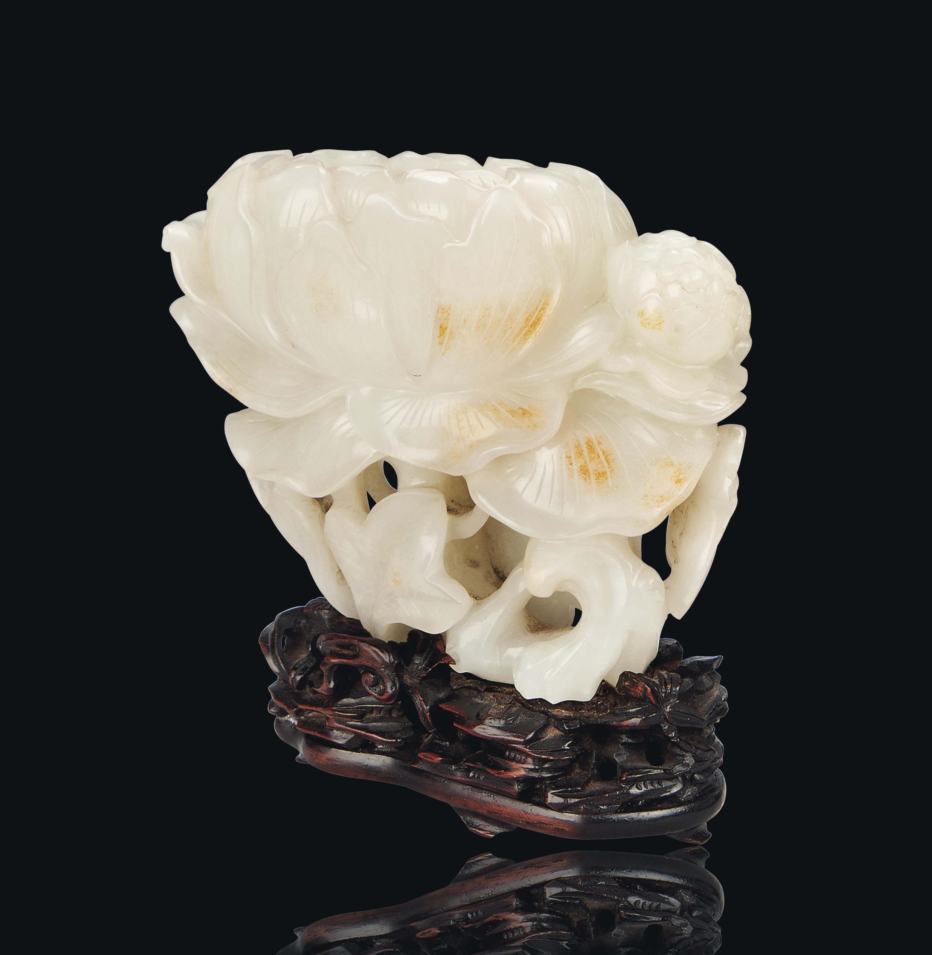 A WHITE JADE CARVING OF A LOTUS FLOWER VASE , 20TH CENTURY