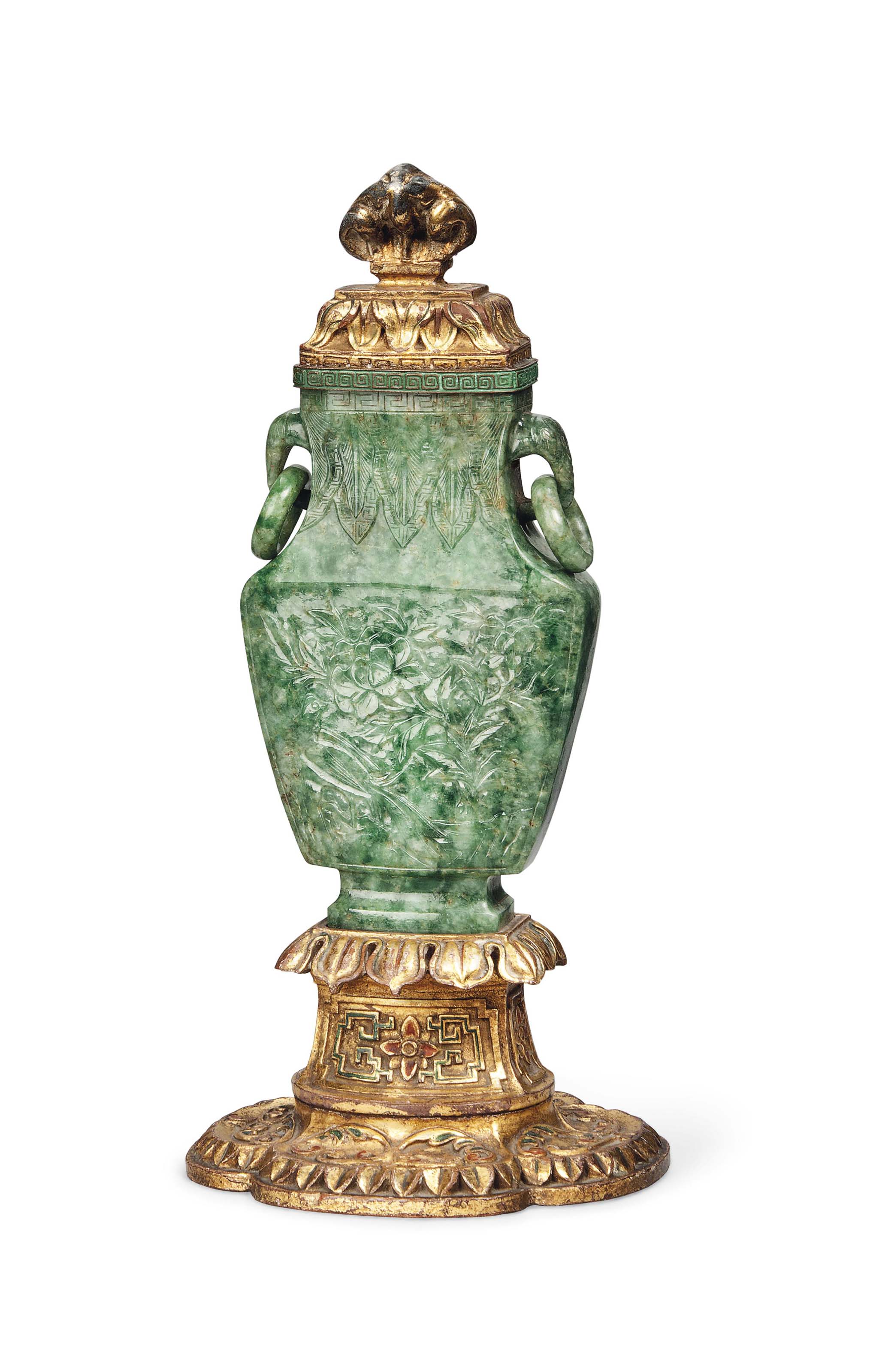 A CARVED AND PIERCED JADEITE VASE Christie's