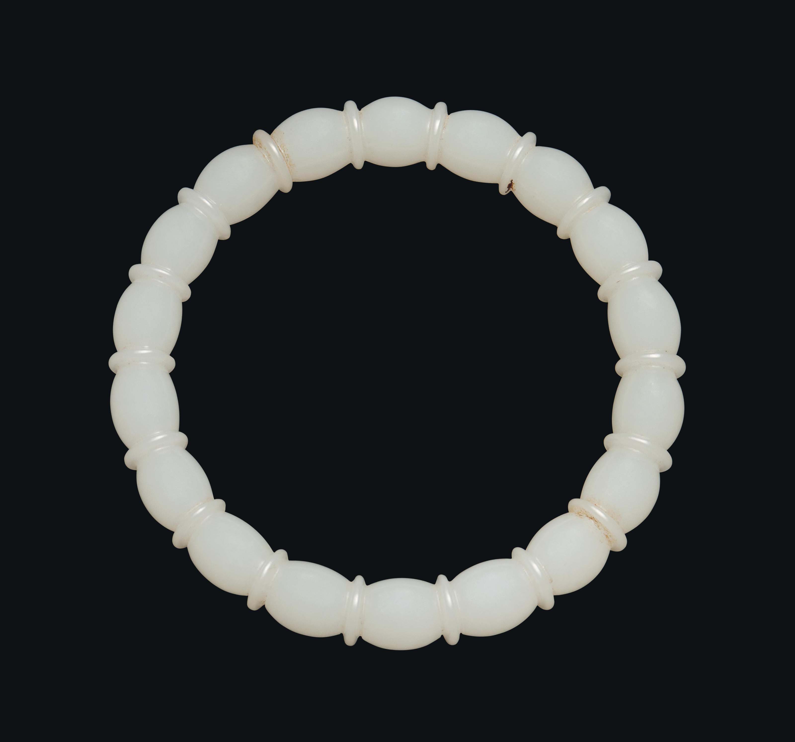A WHITE JADE LOTUS BANGLE Christie s