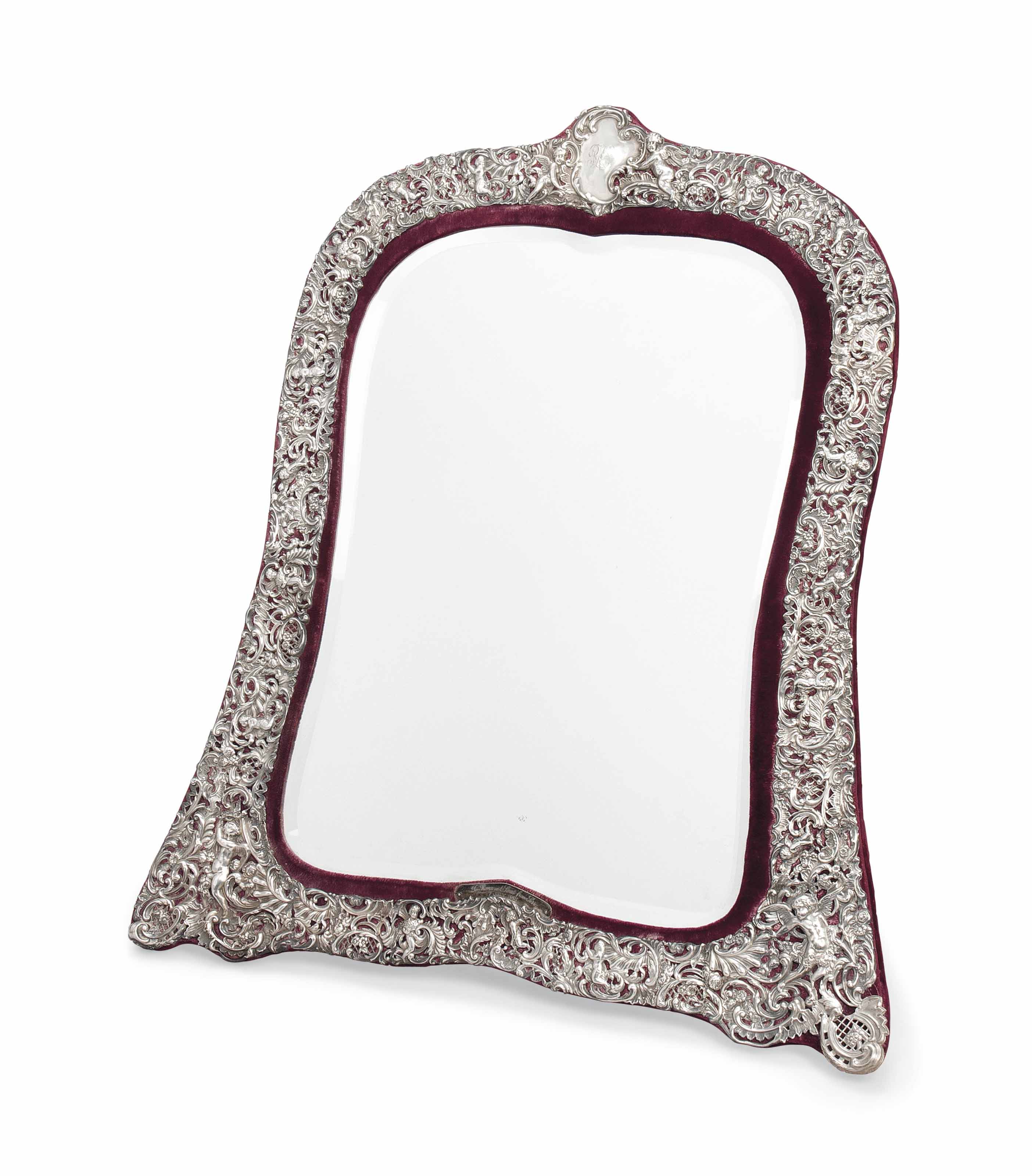 A LATE VICTORIAN SILVERMOUNTED DRESSING TABLE MIRROR