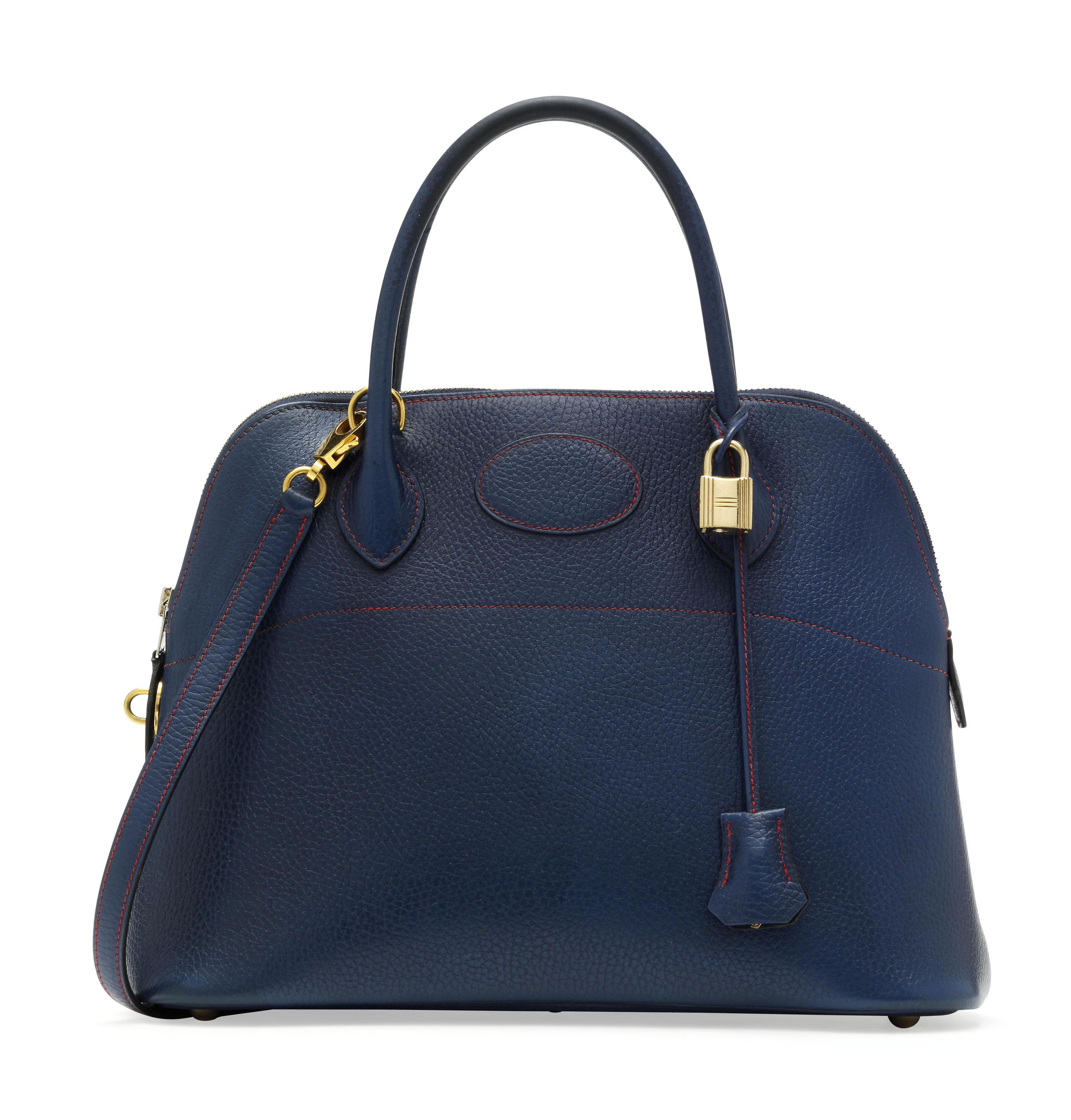 A DARK ROYAL BLUE LEATHER BOLIDE BAG, HERMÈS, 1995 Christie’s