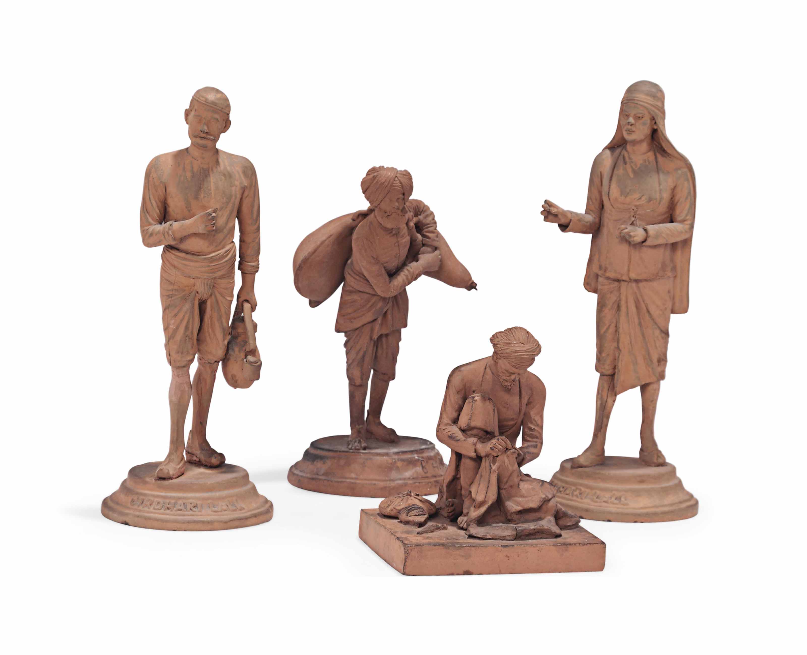 FOUR TERRACOTTA FIGURINES OF INDIAN TRADESMEN , LUCKNOW, INDIA, EARLY