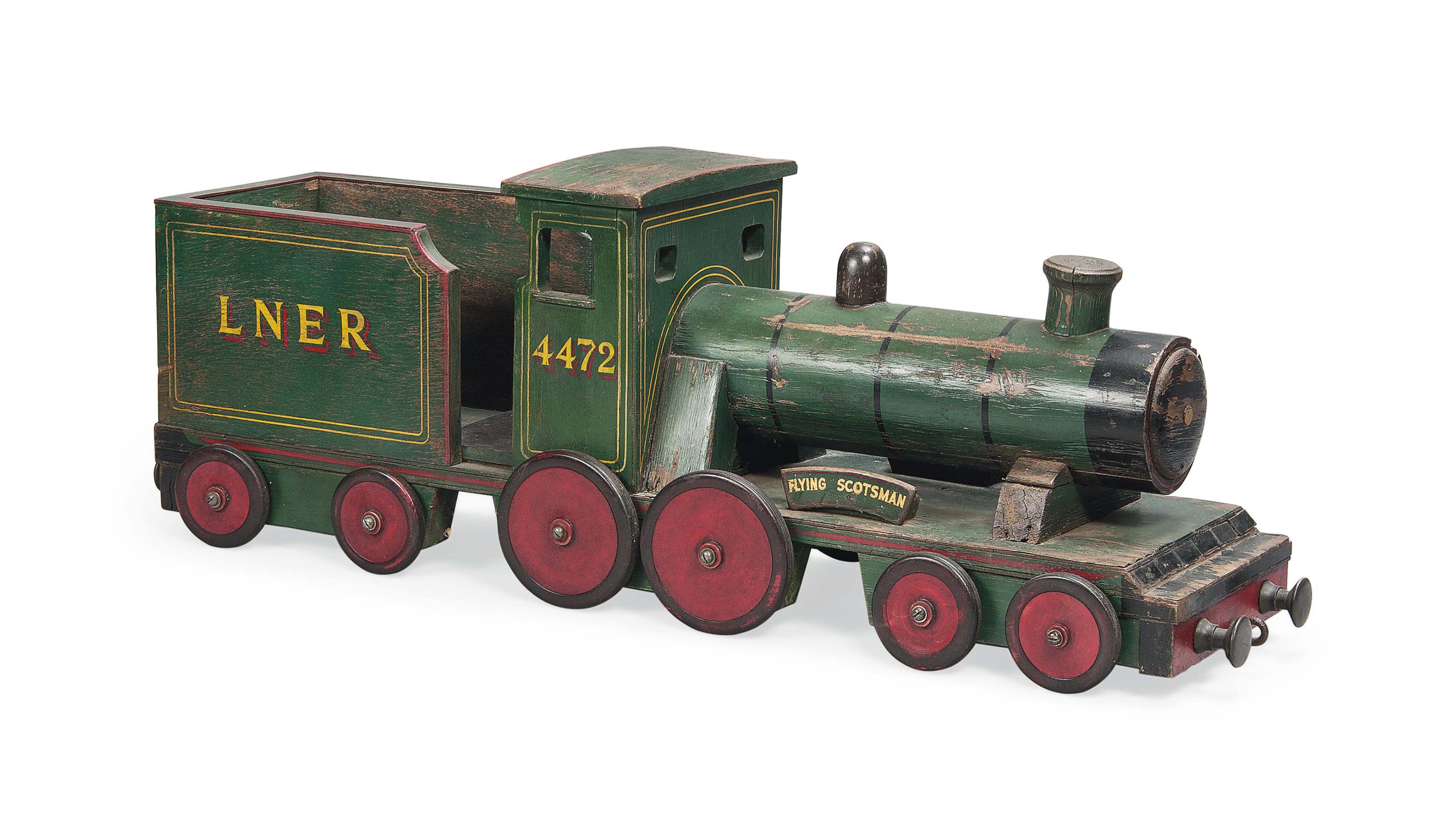 A PAINTED WOOD MODEL TOY 'CARPET TRAIN' OF THE 'FLYING SCOTSMAN