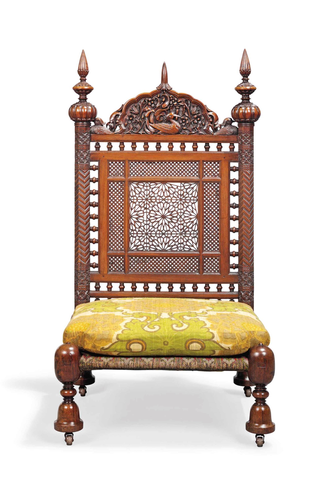 AN INDIAN CARVED HARDWOOD LOW CHAIR
