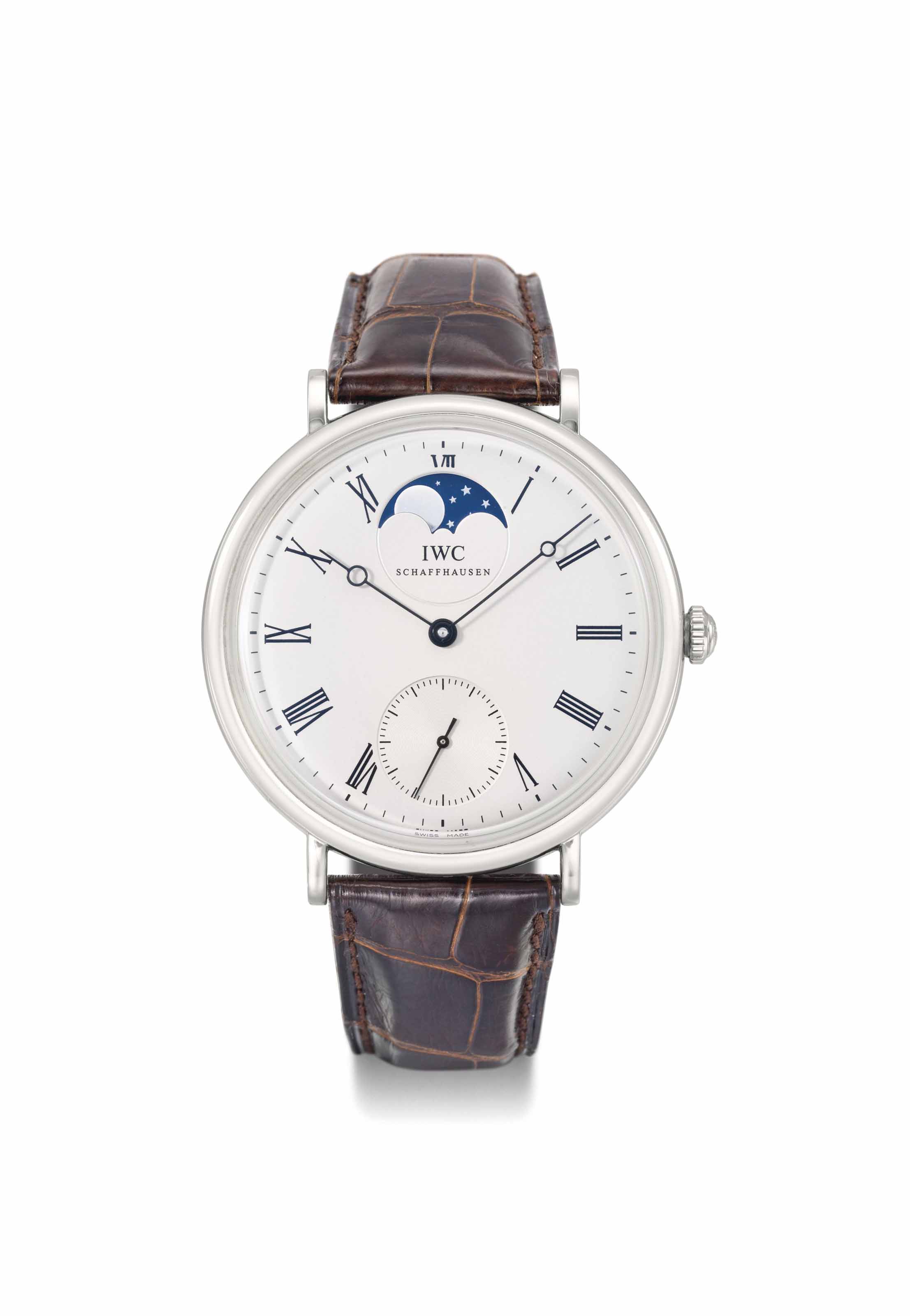 IWC. A large platinum limited edition wristwatch with moon phases SIGNED IWC SCHAFFHAUSEN PORTOFINO MOONPHASE MODEL VINTAGE COLLECTION NO. 100 500 REF. 5448 MOVEMENT NO. 3 032 038 CASE NO. 3 321 788 M...