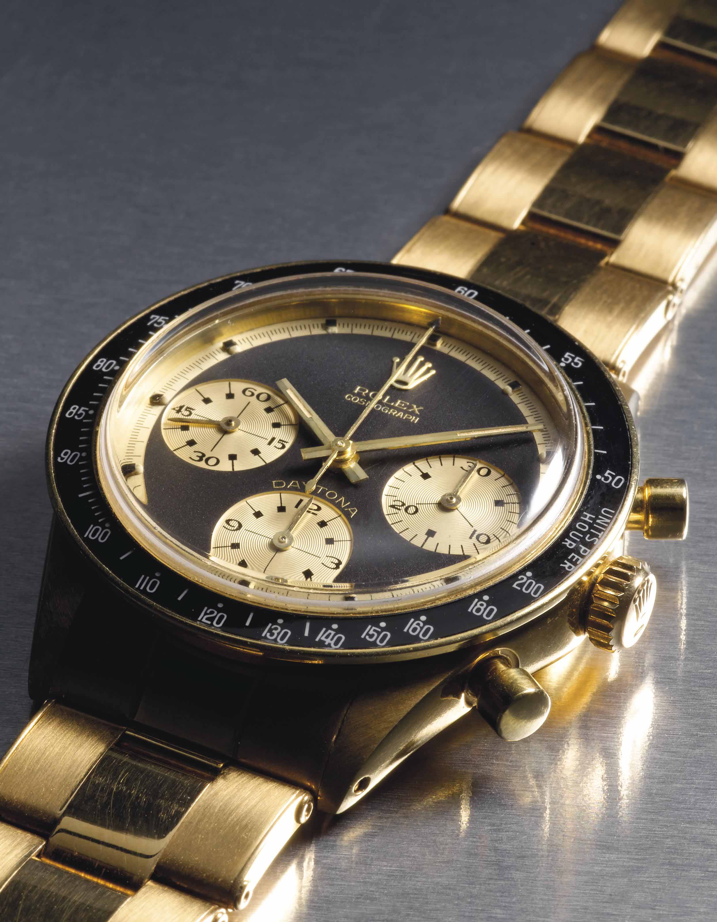 Rolex. An extremely attractive and probably unique 18K gold chronograph wristwatch with bracelet retailed by Hermes SIGNED ROLEX COSMOGRAPH DAYTONA PAUL NEWMAN MODEL REF. 6241 CASE NO. 1 947 352 MANUF...