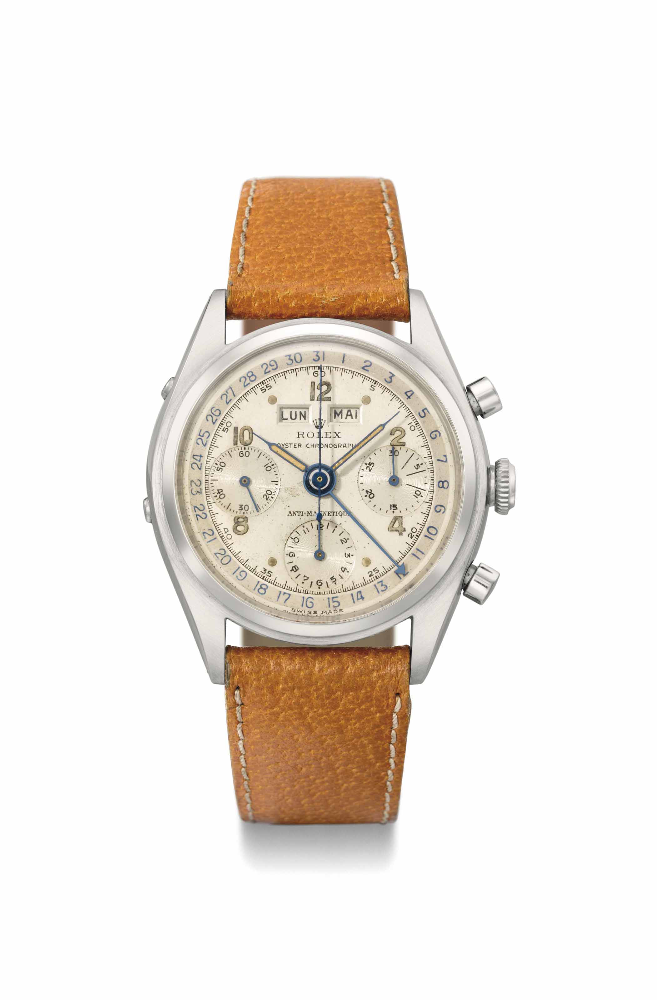 Rolex An extremely fine and rare stainless steel triple calendar