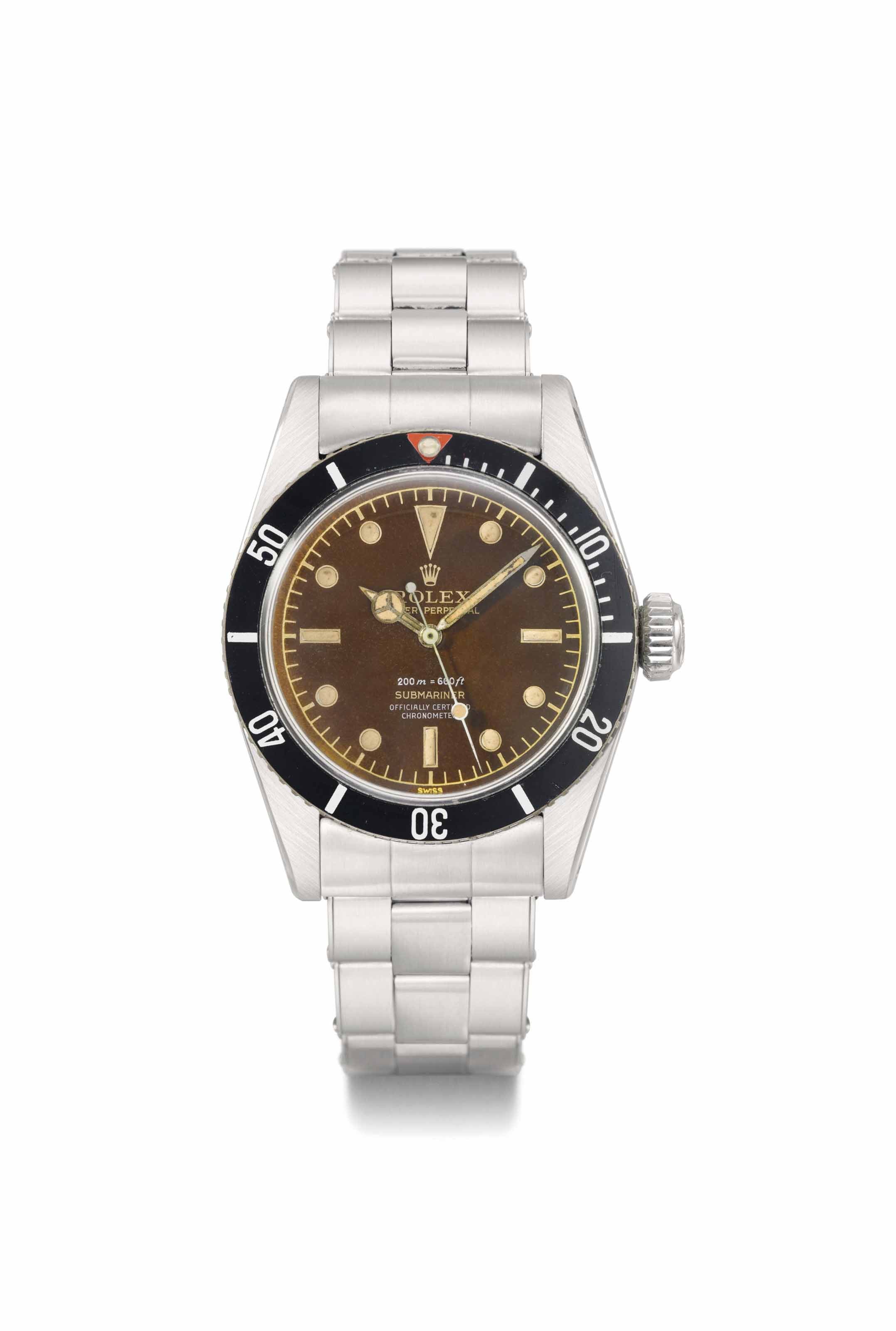 Rolex. A highly charismatic and extremely rare stainless steel automatic sweep centre seconds wristwatch with bracelet and brown-colored ''Four-Liner'' dial, signed Rolex, oyster perpetual, 200m=660ft, submariner, ref. 6538, case no. 449'170, circa 1959. 37  mm  diam. Sold for CHF 519,750 on 13 May 2013 at Christie&rsquo;s in Geneva