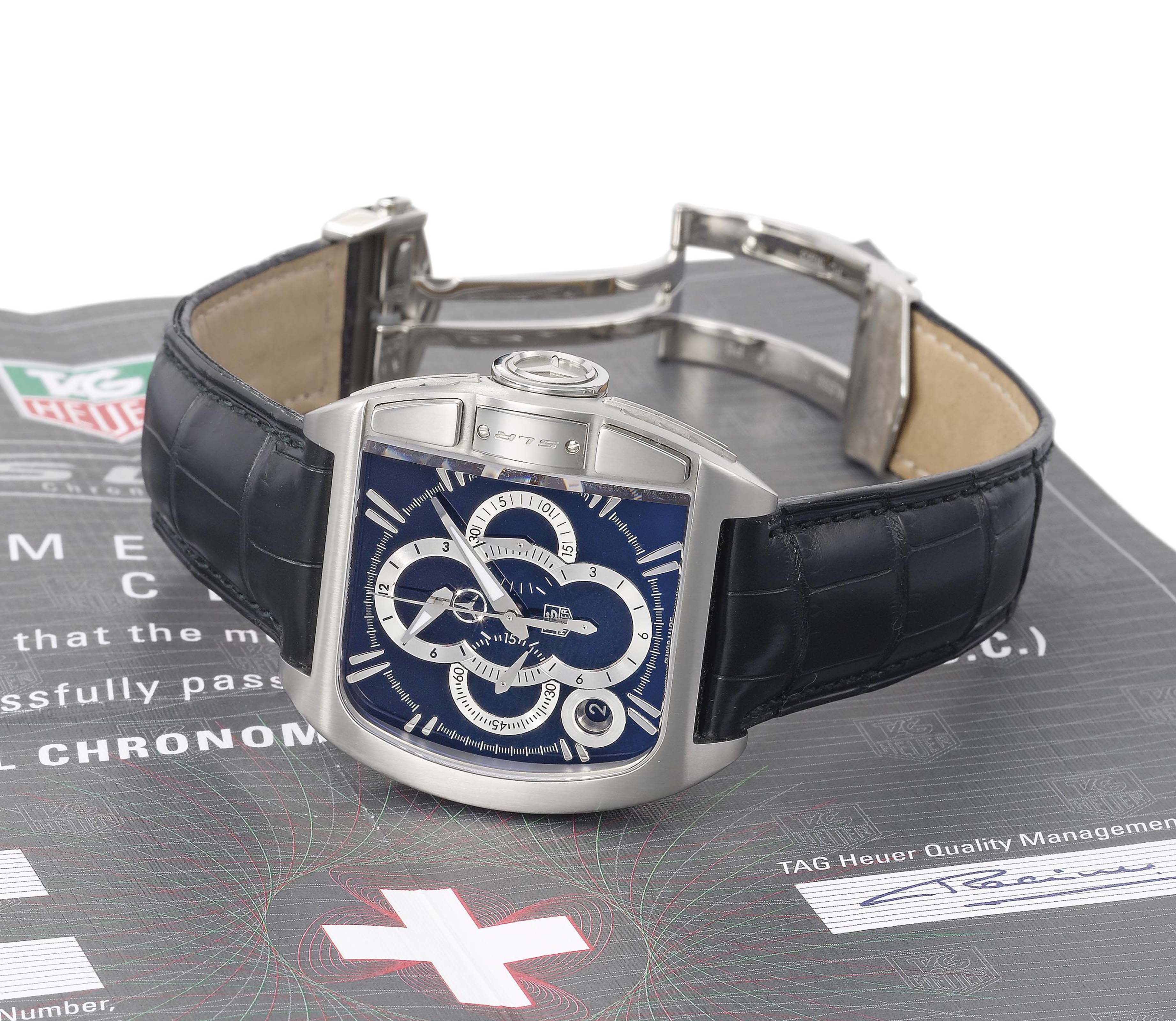 Tag Heuer And Mercedes Benz A Large Stainless Steel Limited Edition Tonneau Shaped Automatic Chronograph Wristwatch With Black Regulator Dial And Date Signed Tag Heuer And Mercedes Benz Slr Chronograph Limited Edition No 259