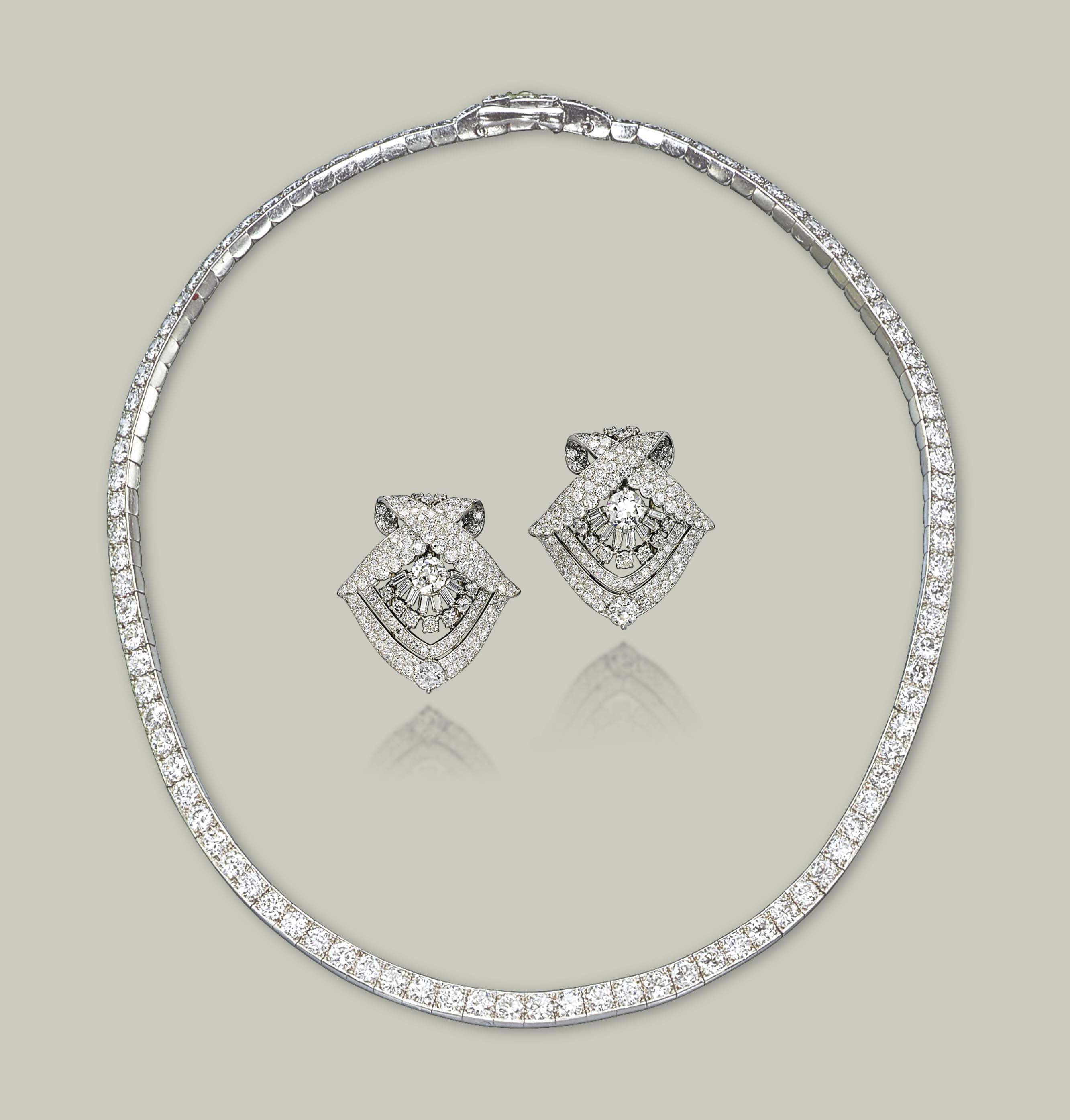 A SET OF DIAMOND JEWELLERY, BY CARTIER