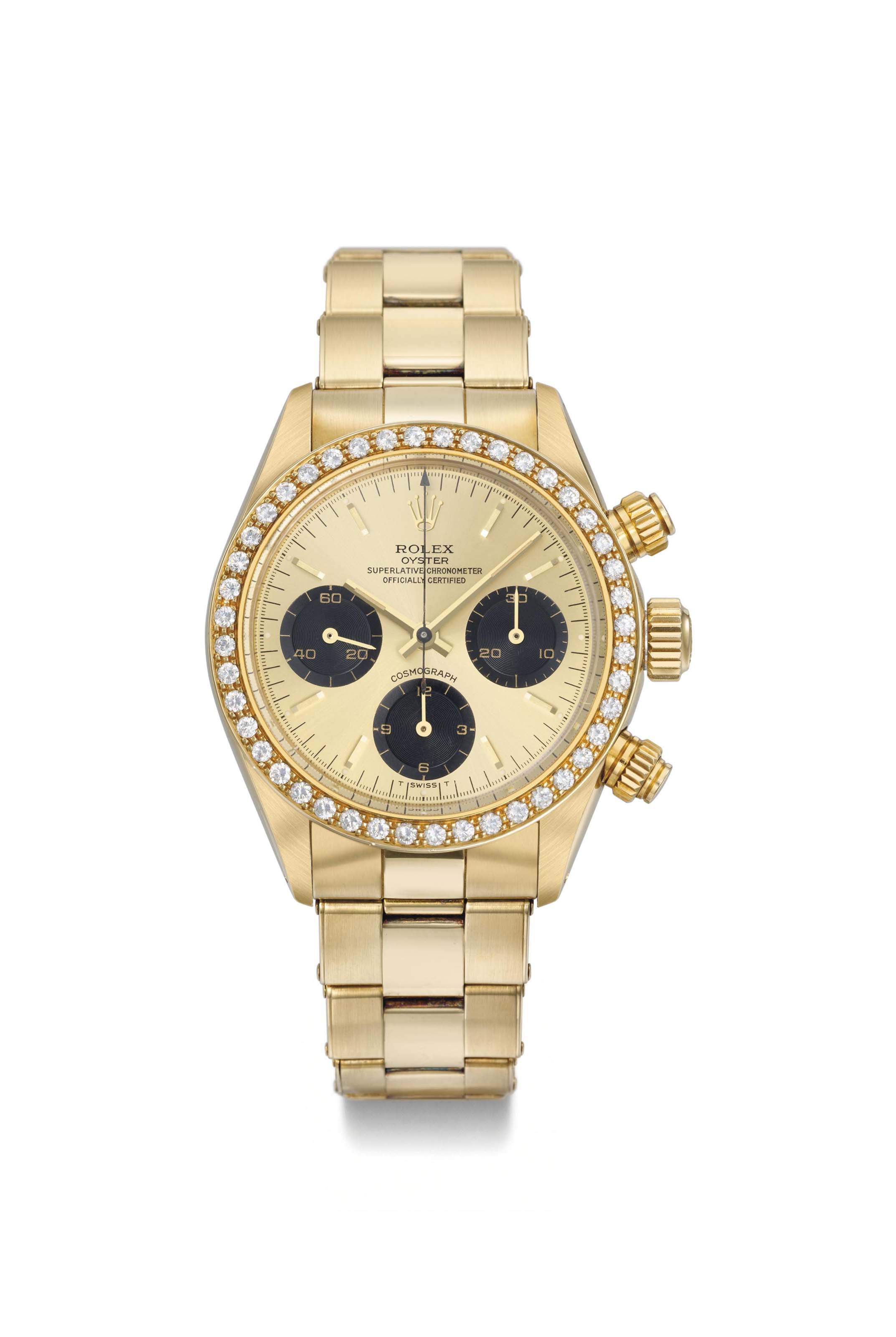 Rolex. An extremely rare and very attractive 18K gold, diamond and  sapphire-set chronograph wristwatch with bracelet, original guarantee and  box
