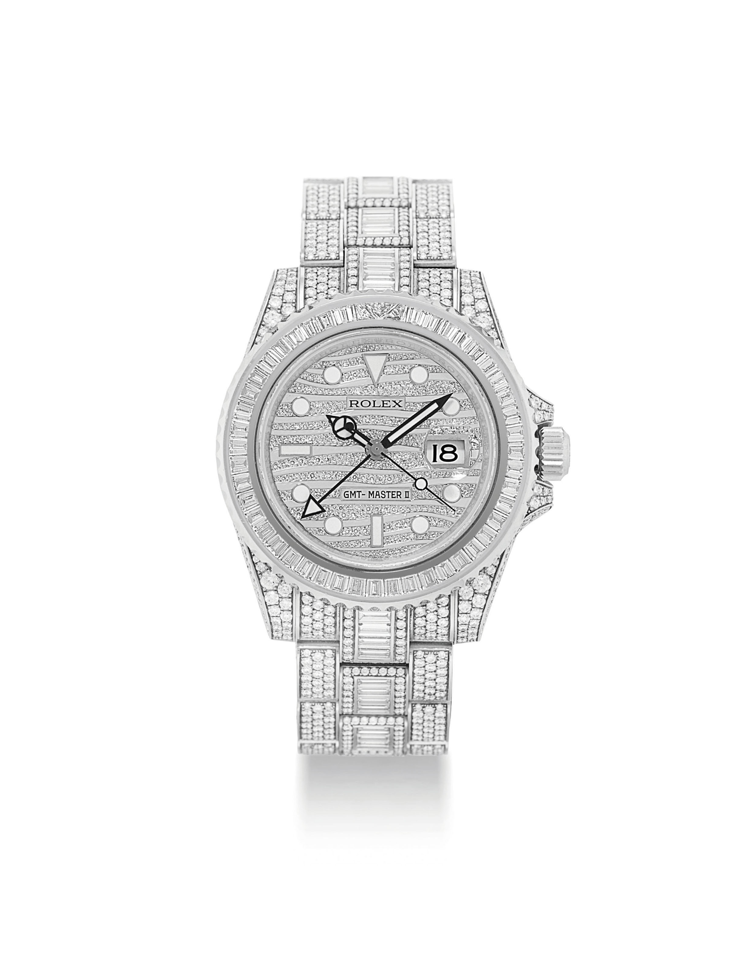 ROLEX. AN IMPRESSIVE AND VERY RARE 18K WHITE GOLD AND DIAMOND SET AUTOMATIC DUAL TIME WRISTWATCH WITH SWEEP CENTRE SECONDS DATE AND BRACELET SIGNED ROLEX GMT MASTER II ICE MODEL REF. 116769 CASE