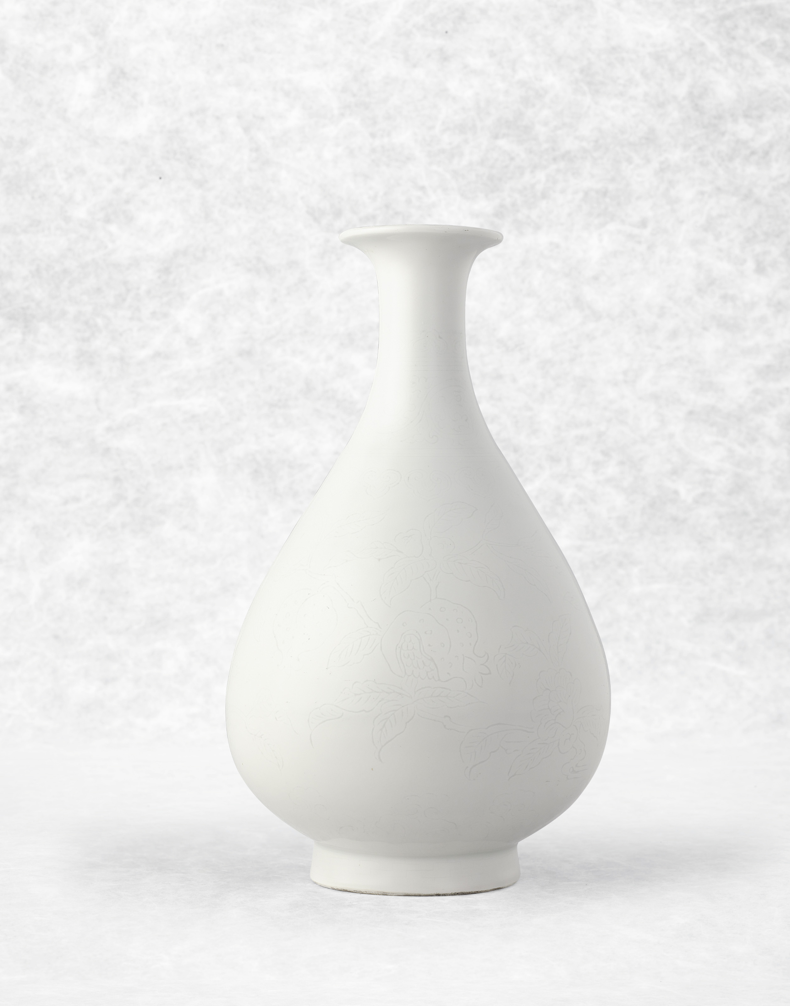 明永樂甜白釉暗花榴開百子玉壺春瓶, YONGLE PERIOD (1403-1425